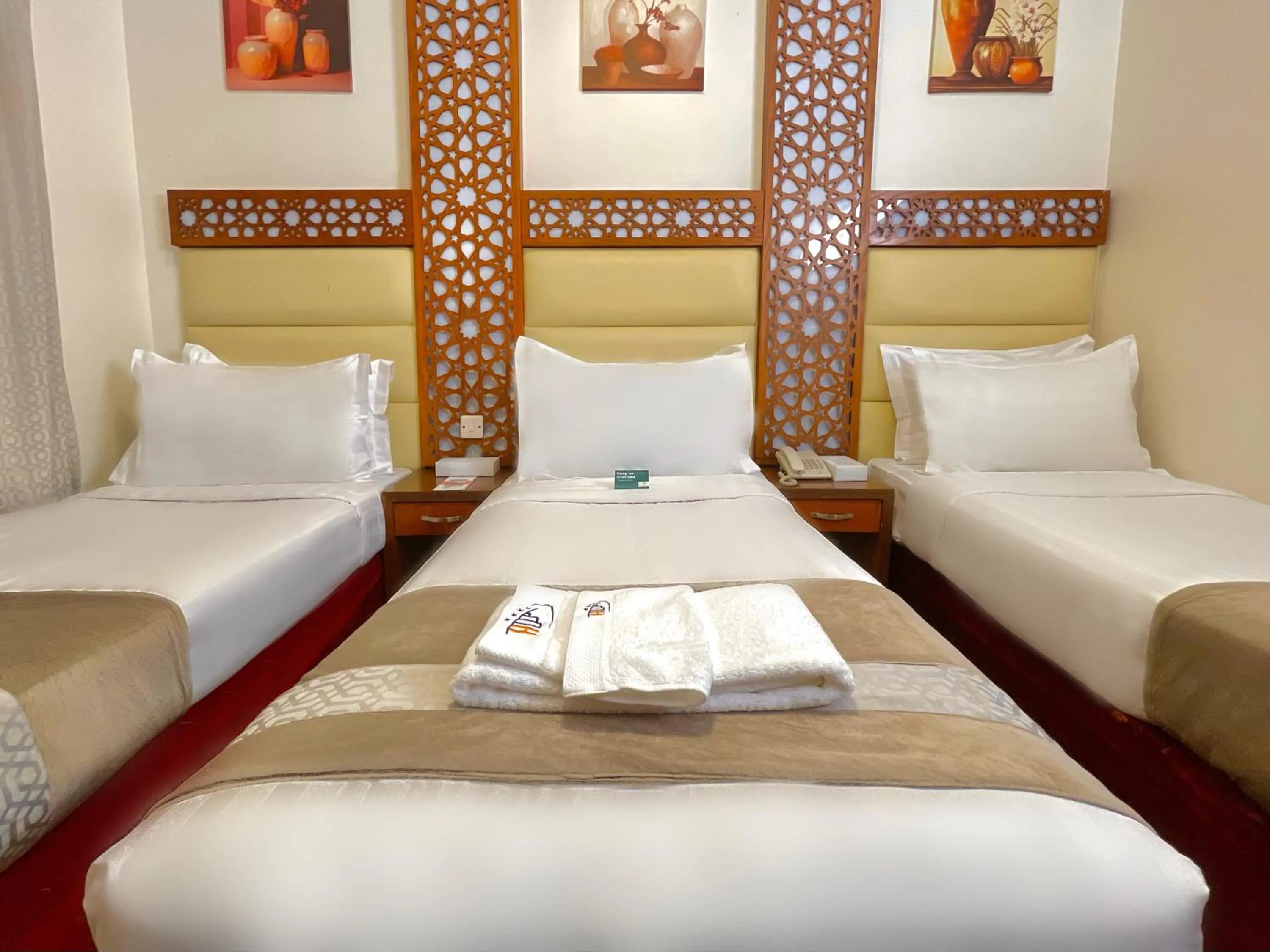 View (from property/room), Bed in Rawdhat Al Mukhtara Hotel