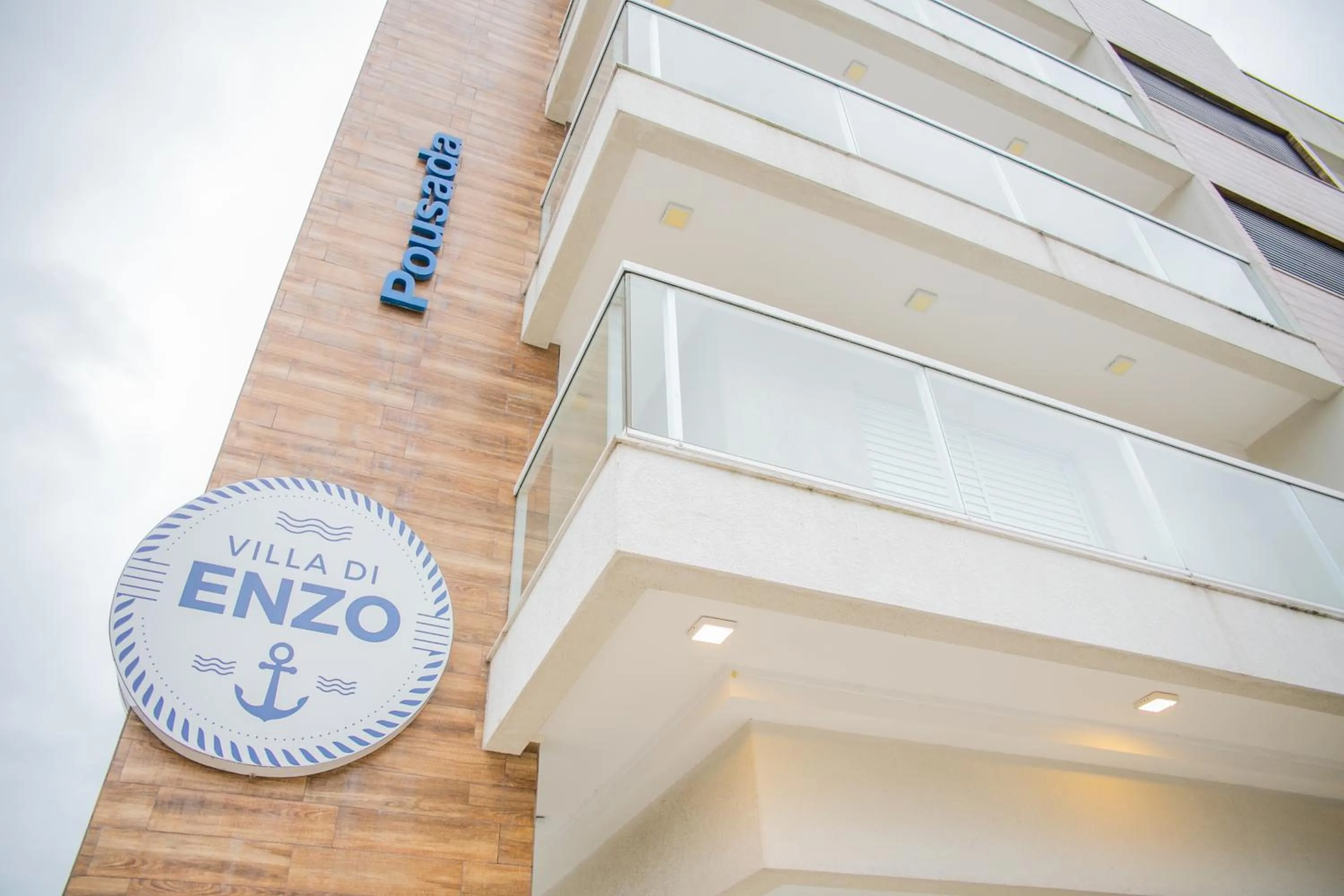 Property logo or sign in Pousada Villa Di Enzo