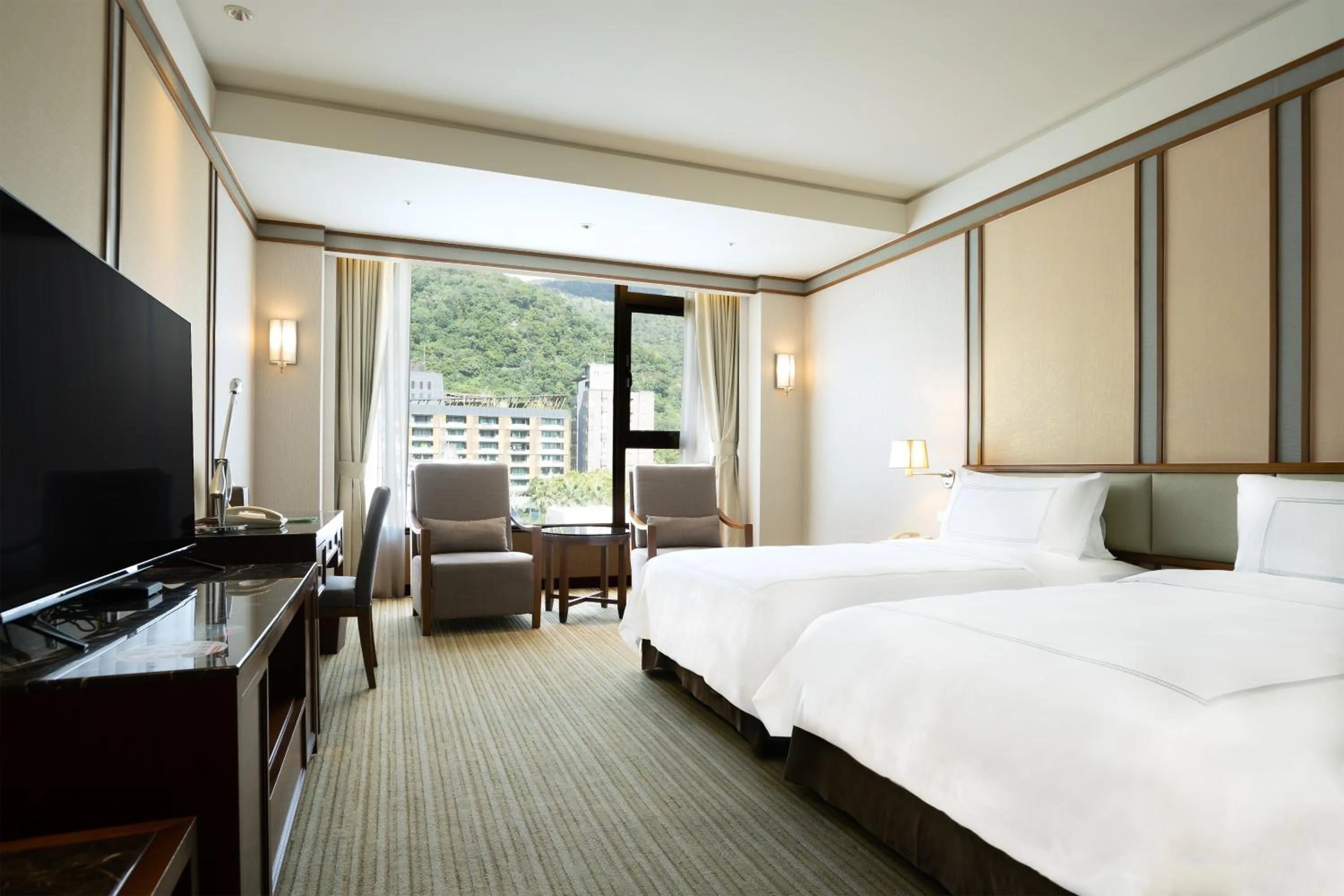 Bed in Evergreen Resort Hotel - Jiaosi