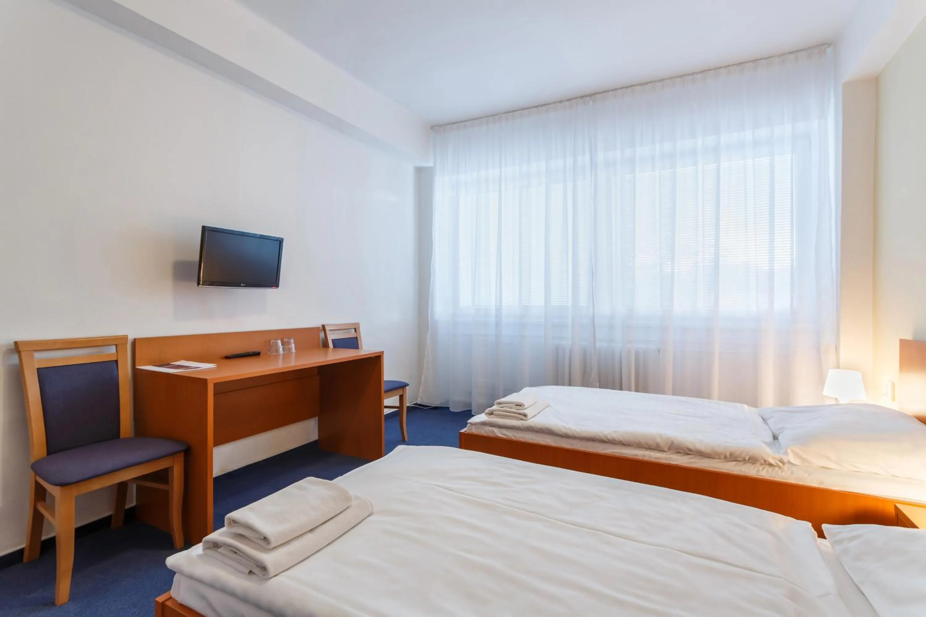 Bed in Hotel Veronika