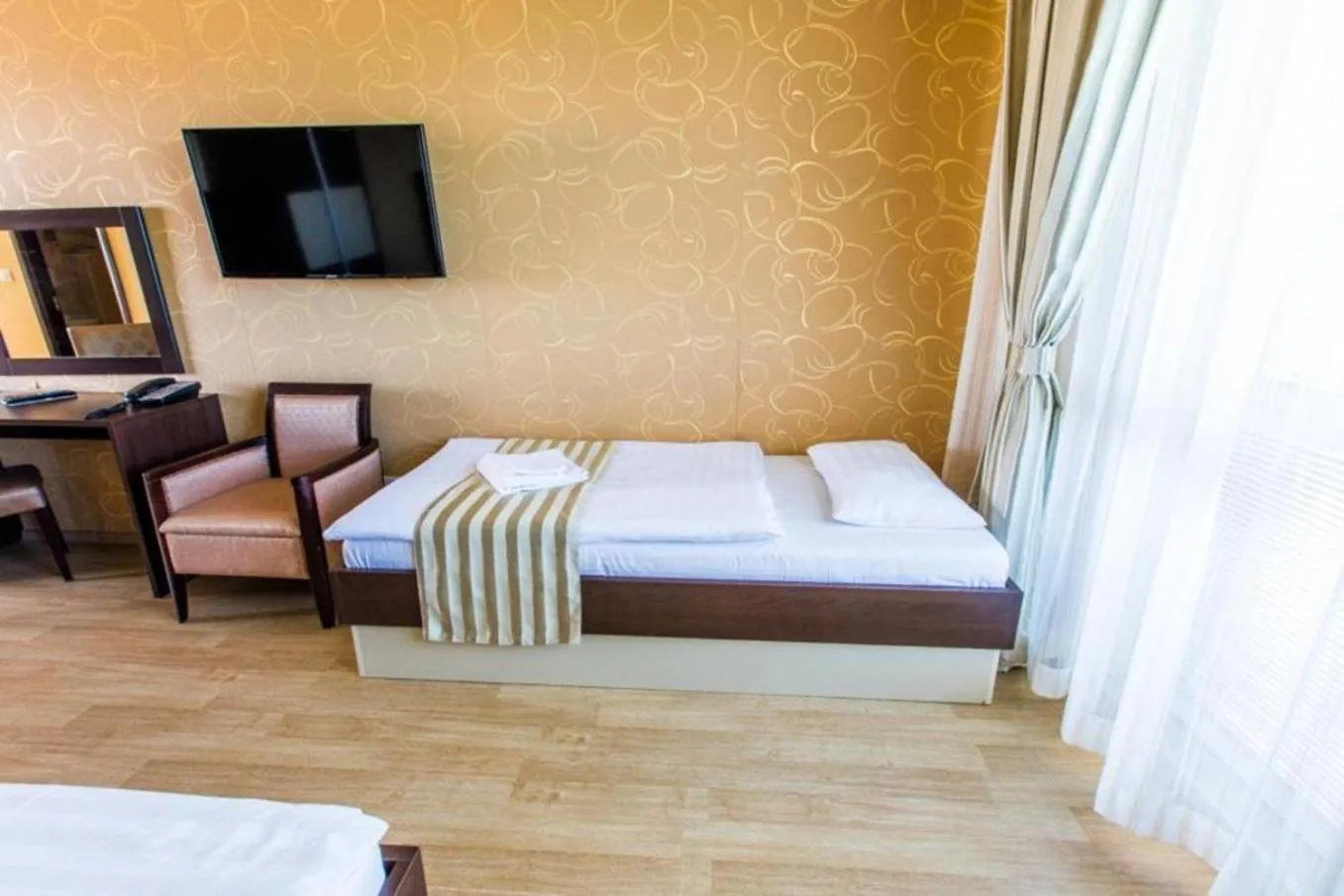 Photo of the whole room, Bed in Hotel Sun