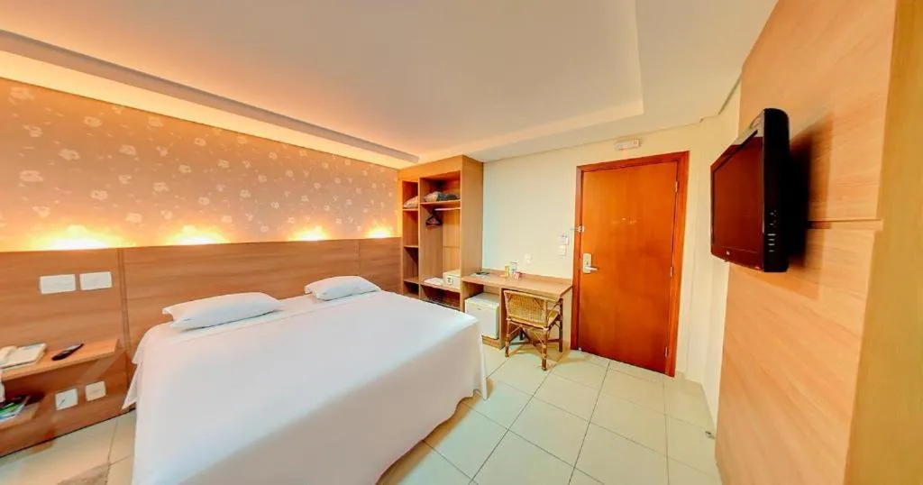 Bed in Amazon Plaza Hotel