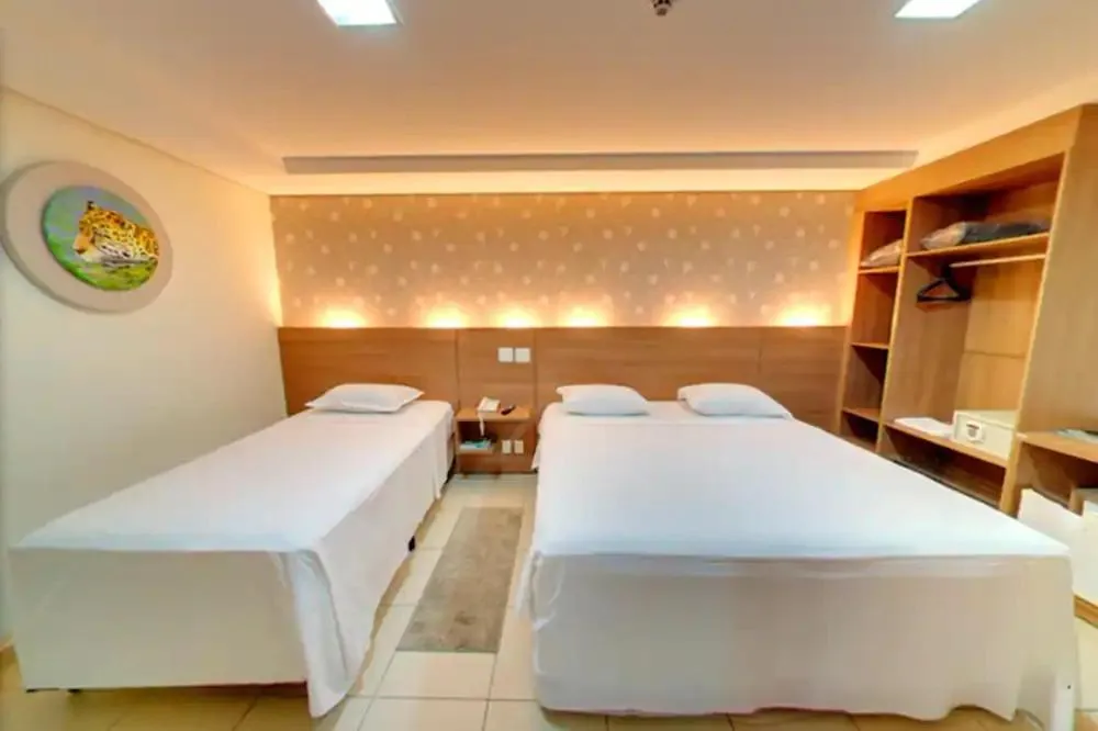 Bed in Amazon Plaza Hotel