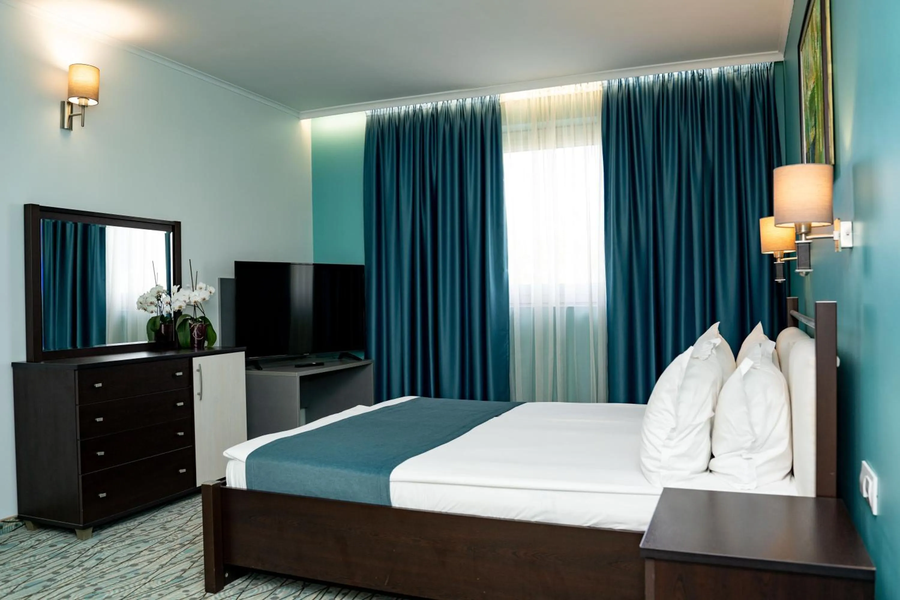 Bed in Aqua Hotel
