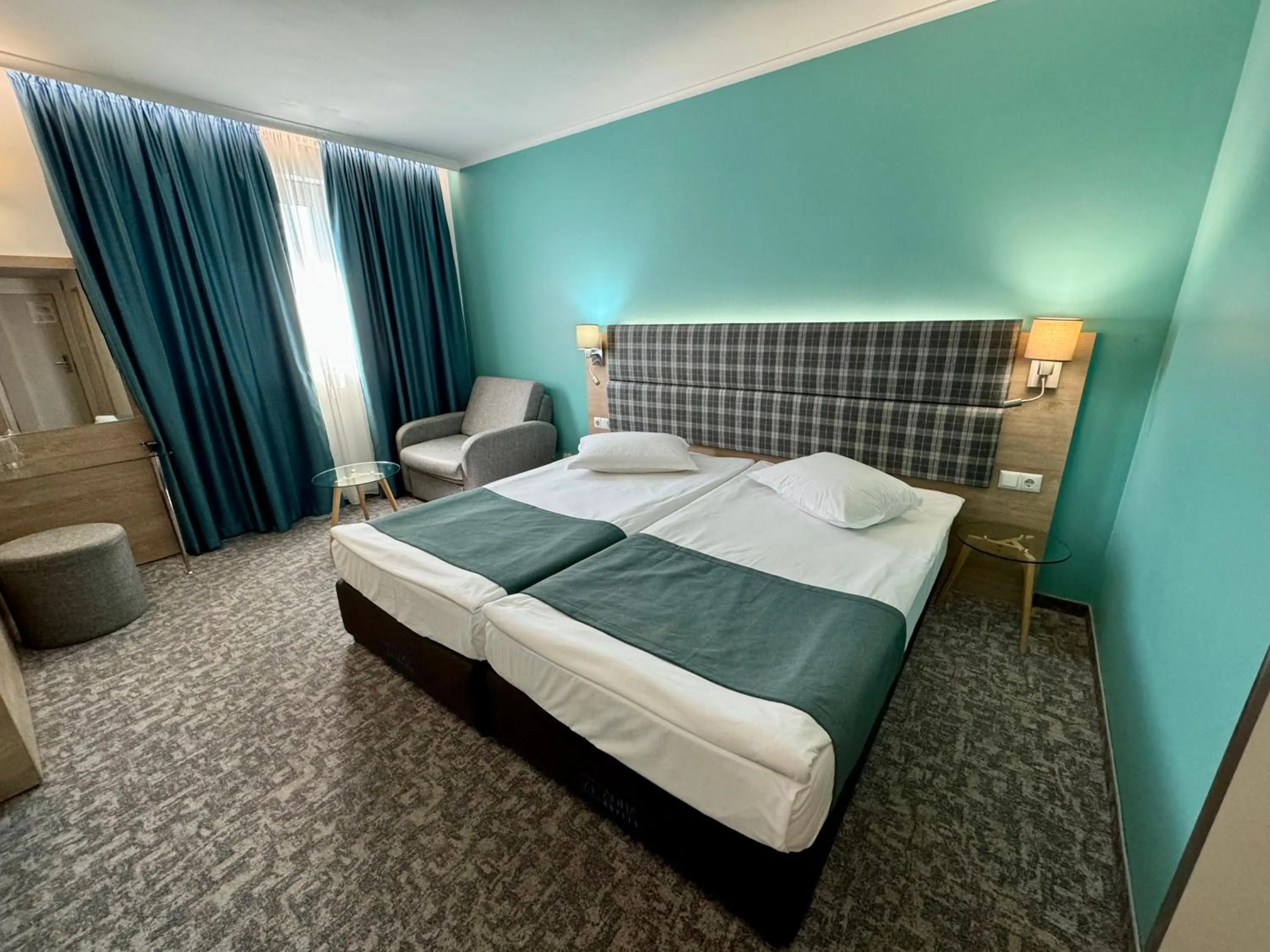 Photo of the whole room, Bed in Aqua Hotel