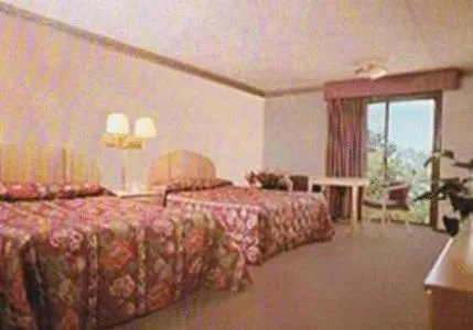 Bed in Chateau Royale Inn