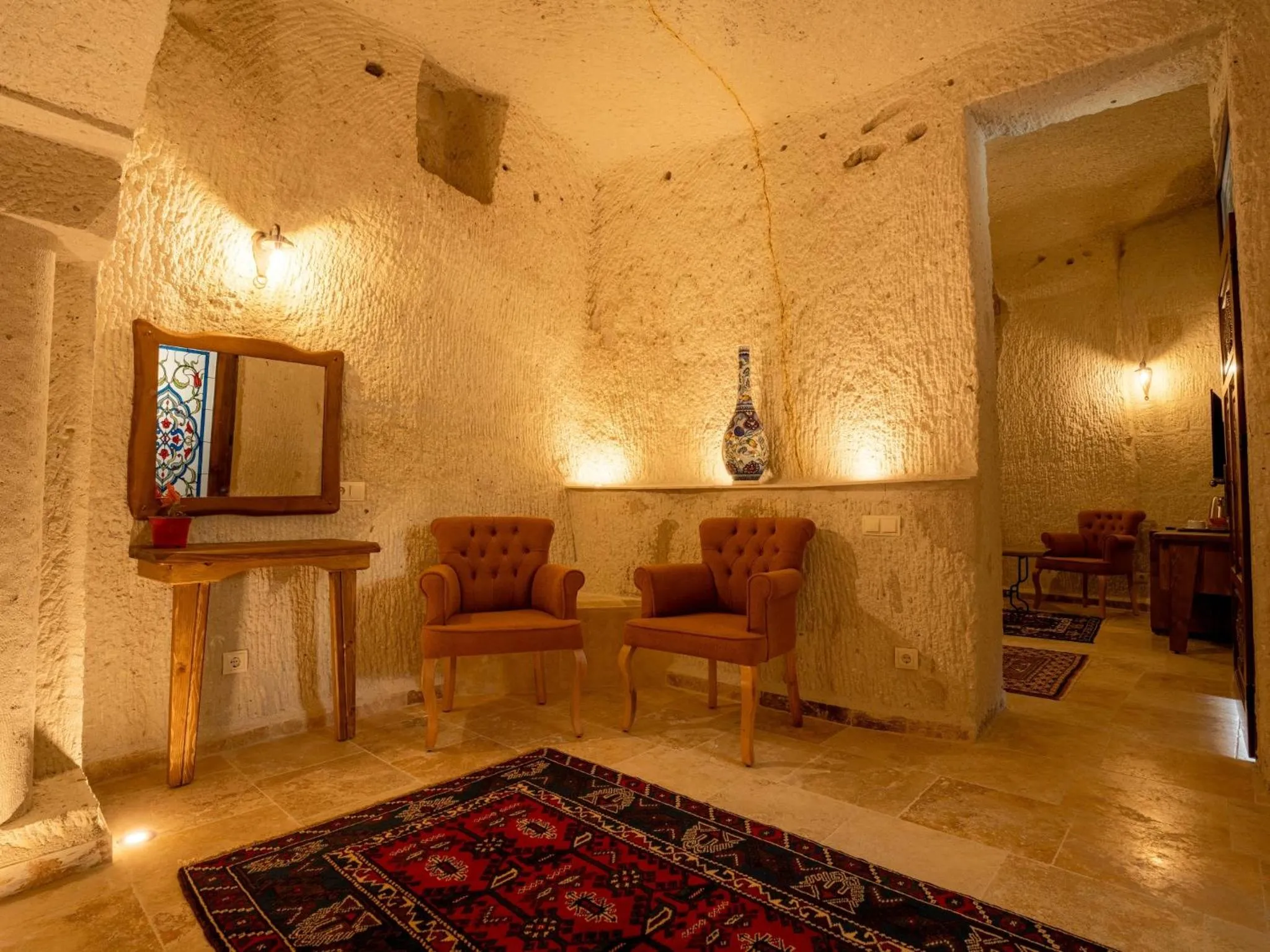 Seating area in Tulip Cave Suites