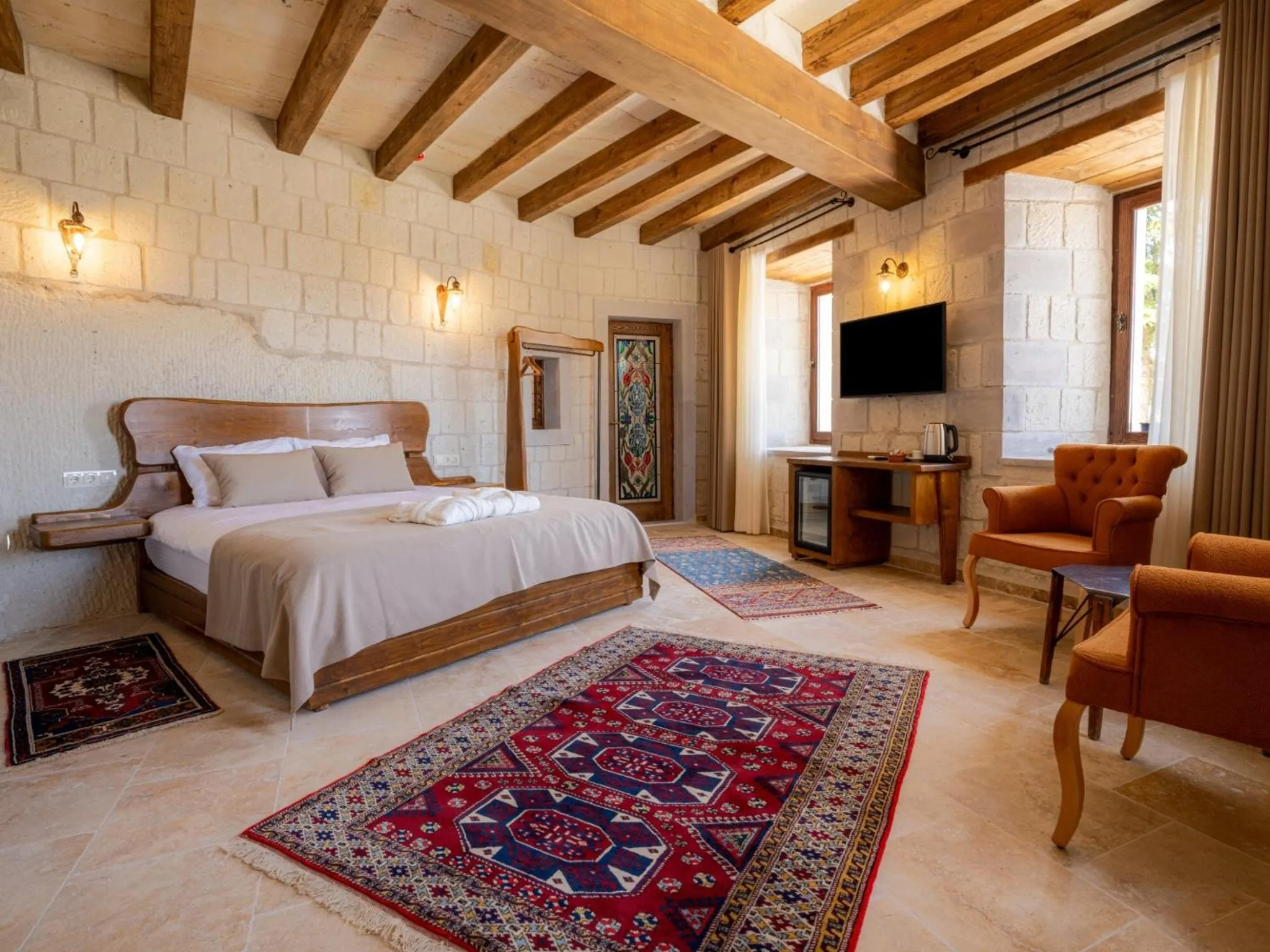 Bed in Tulip Cave Suites