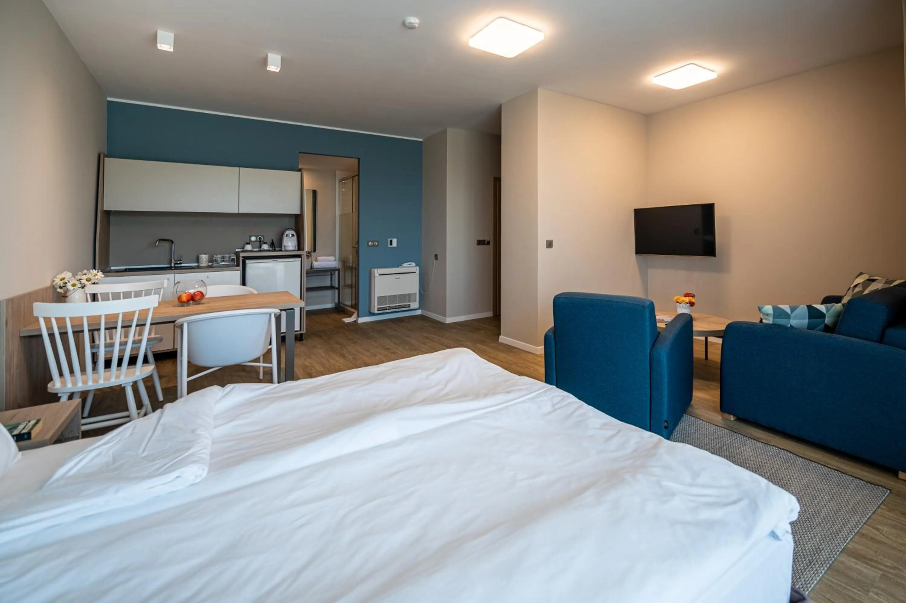 Bed in Romance Hotel and Family Suites