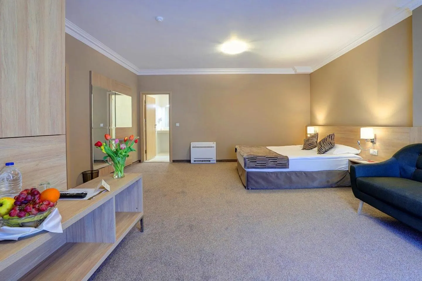 Bed in Romance Hotel and Family Suites