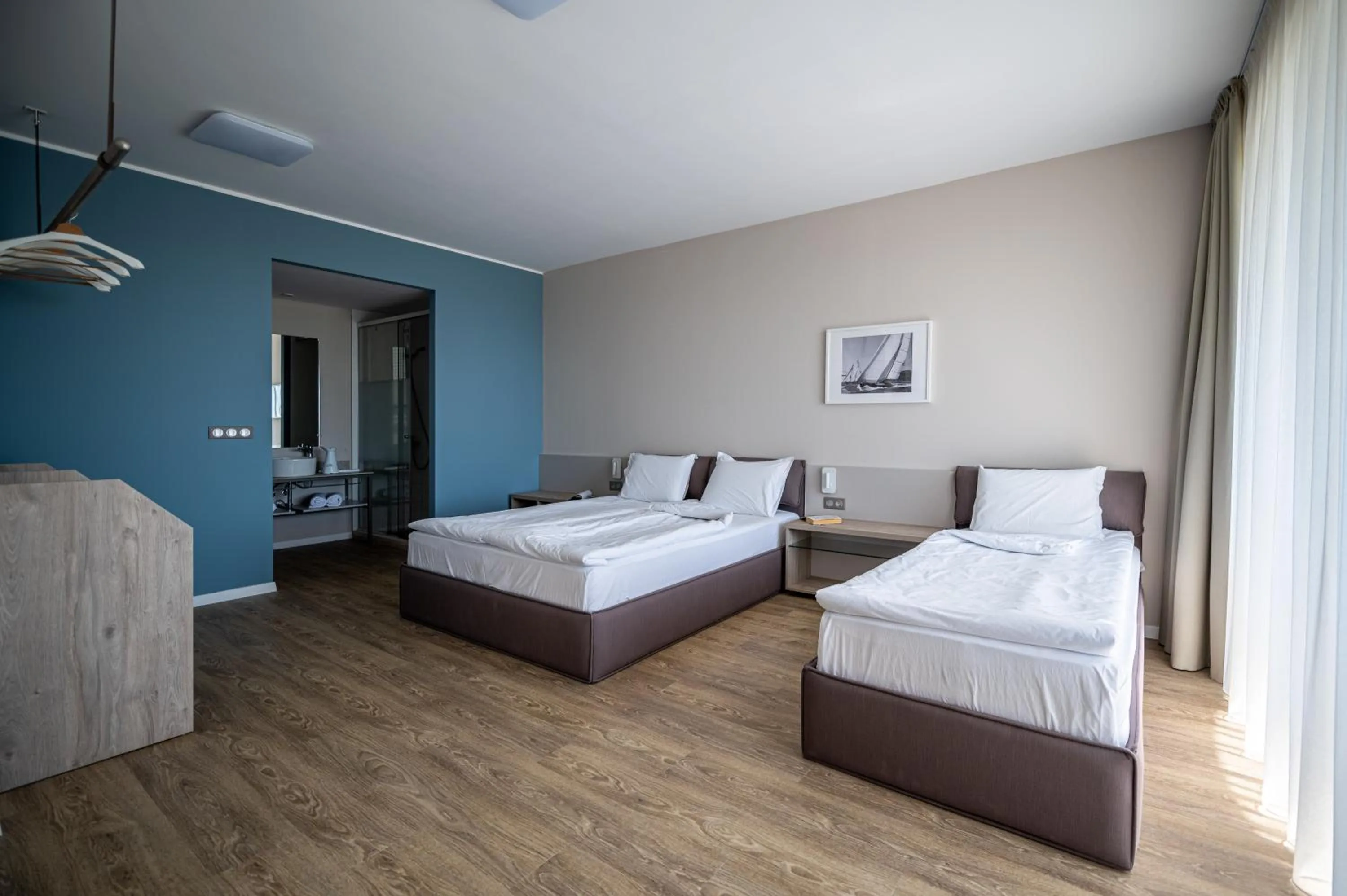 Bed in Romance Hotel and Family Suites