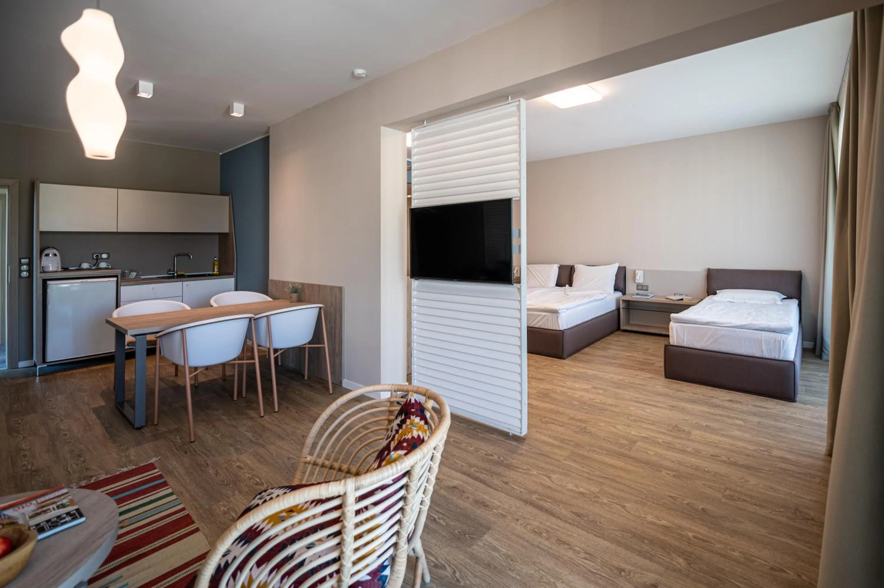 Bed in Romance Hotel and Family Suites