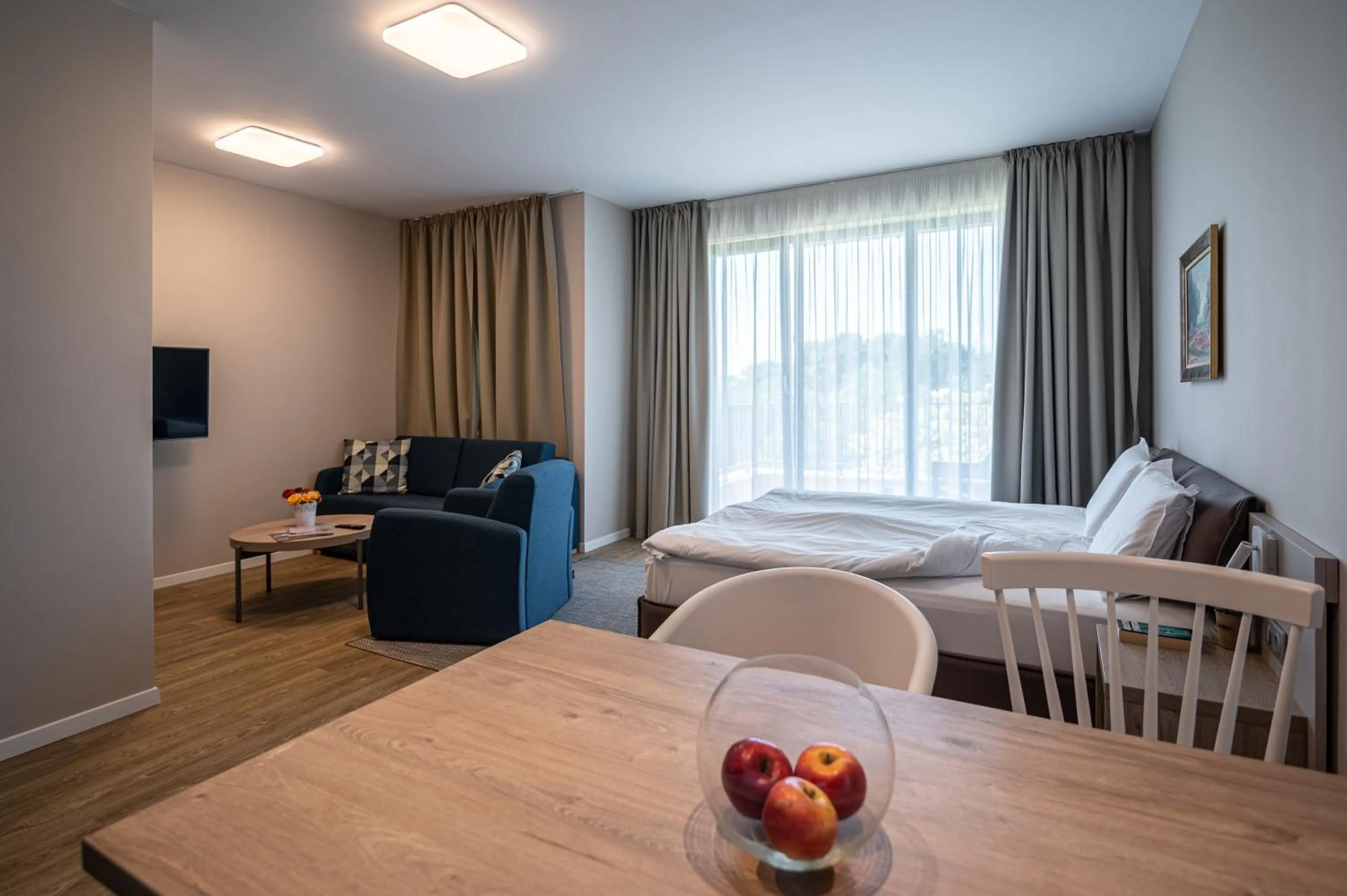 Bed in Romance Hotel and Family Suites