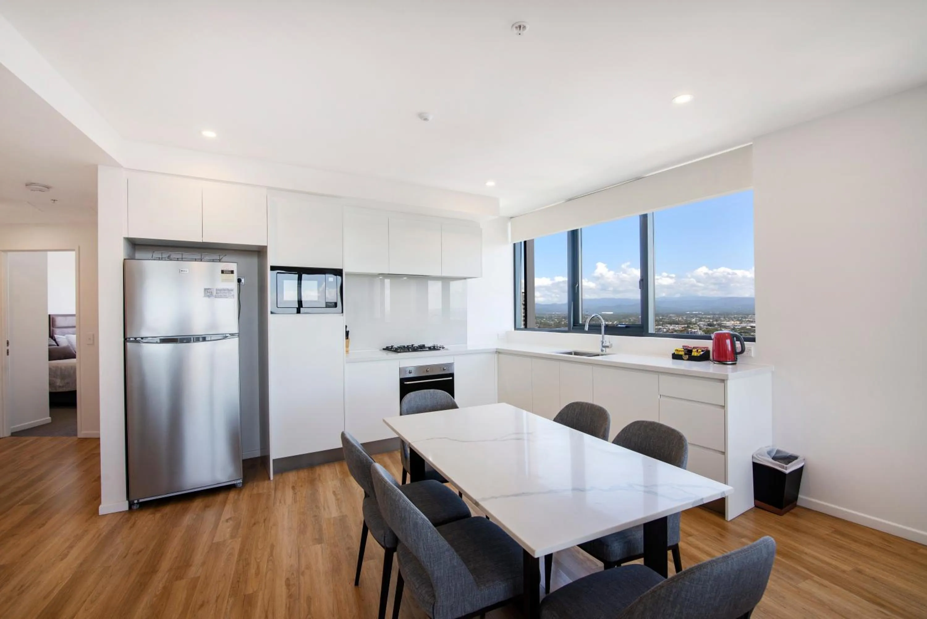 Kitchen or kitchenette in Ruby Gold Coast by CLLIX