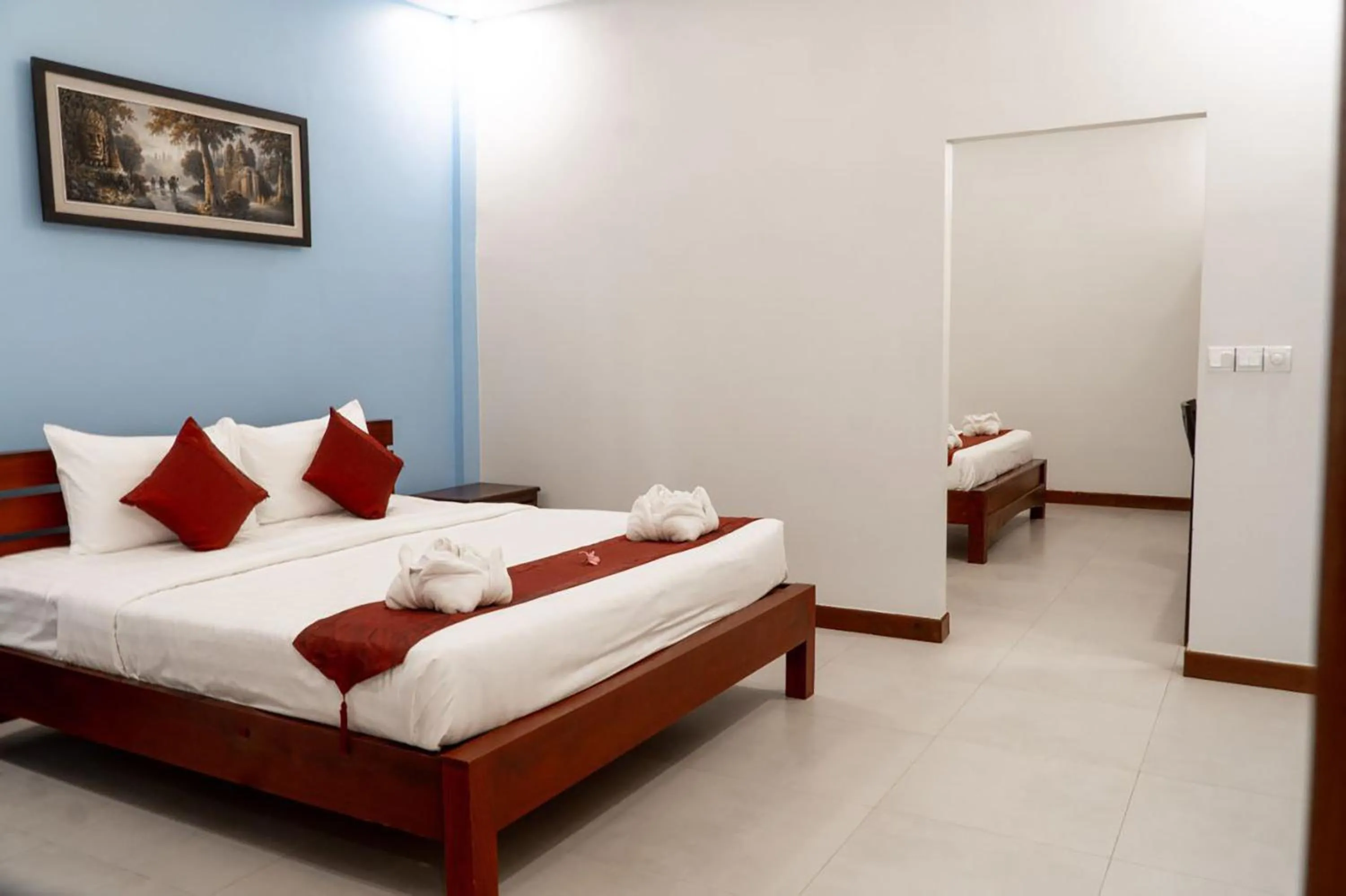 Photo of the whole room, Bed in Lavender Angkor Boutique