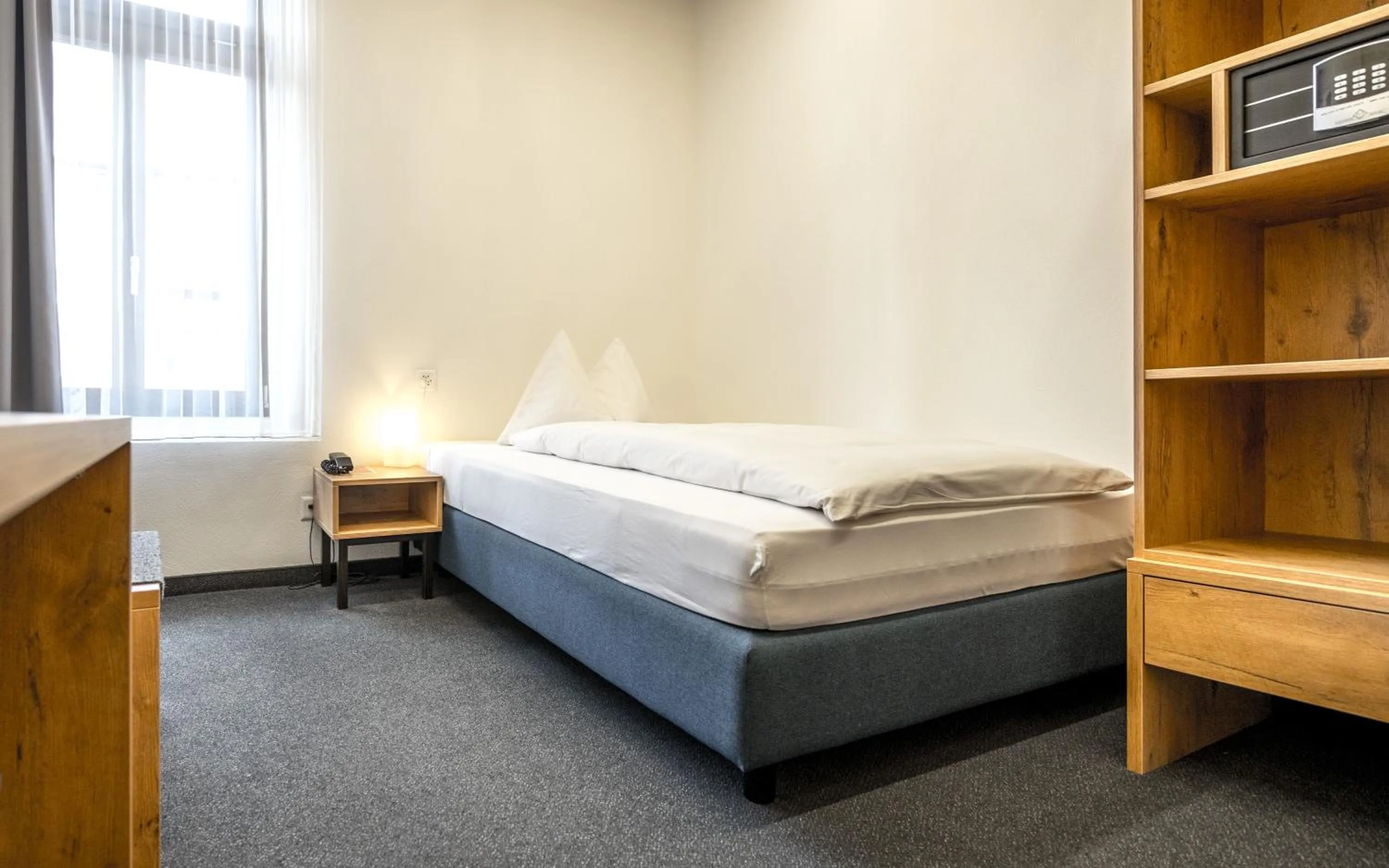 Photo of the whole room, Bed in Hotel Ochsen by Mountain Hotels
