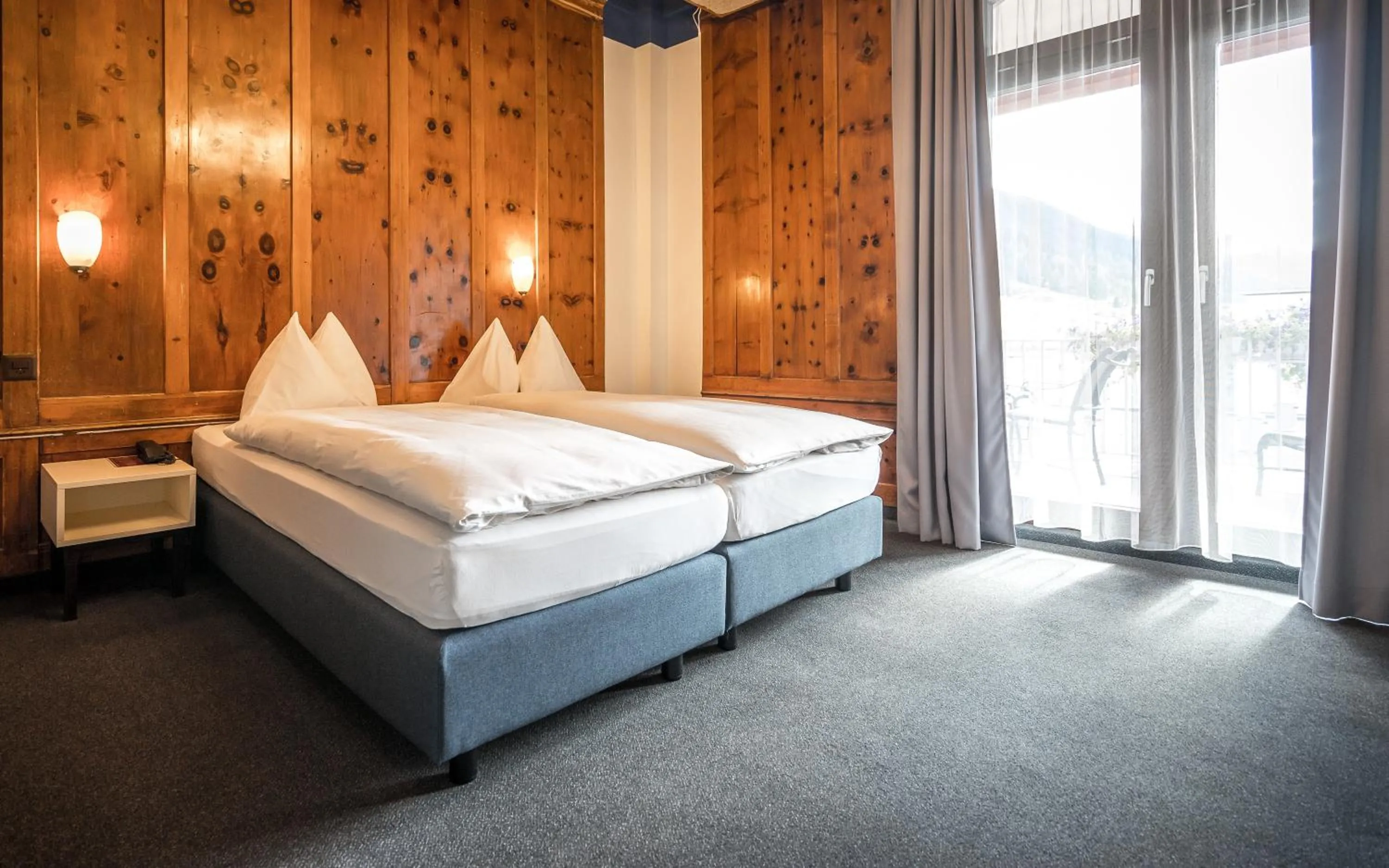 Bed in Hotel Ochsen by Mountain Hotels
