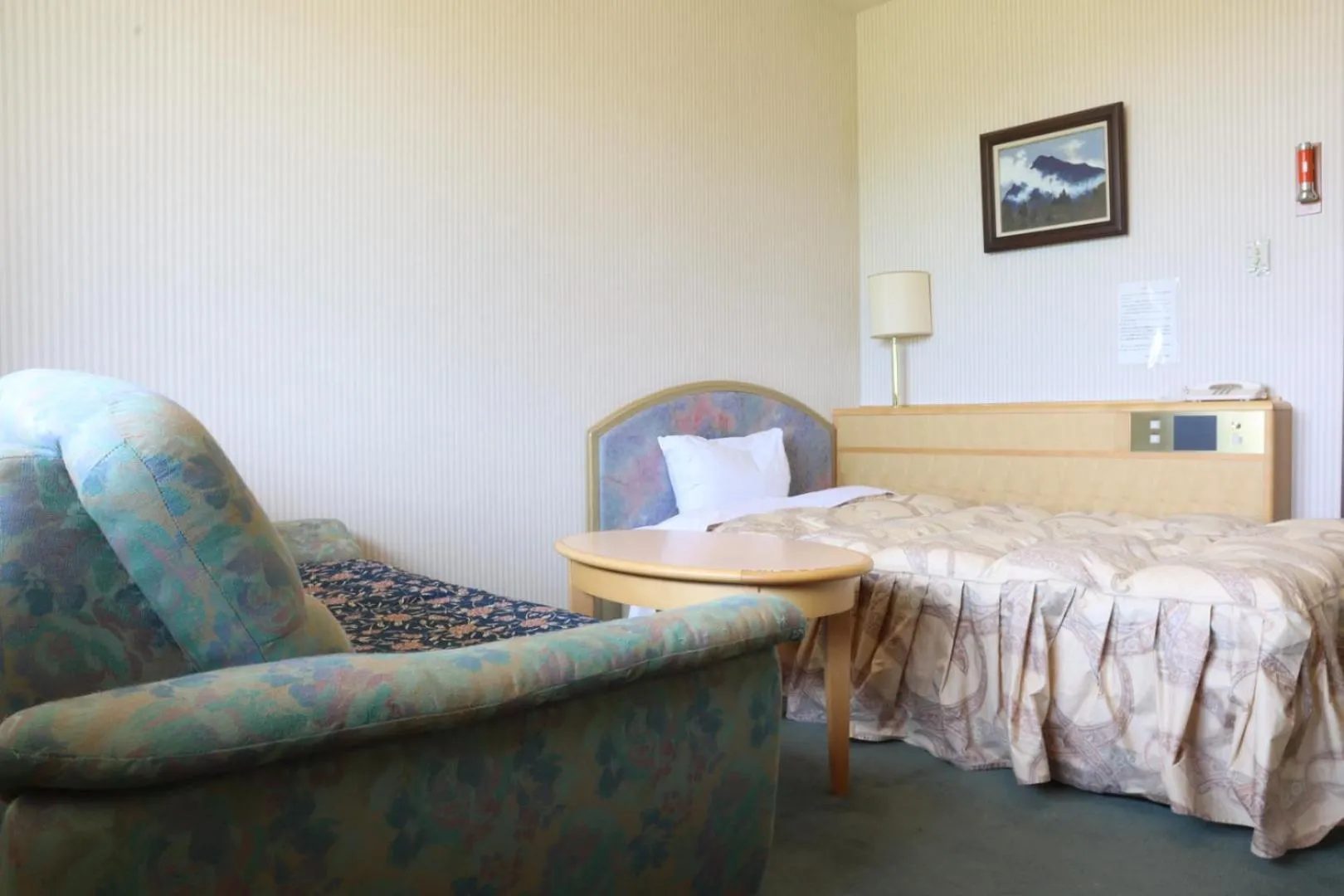 Bed in Hotel Tetoraresort Tokachigawa