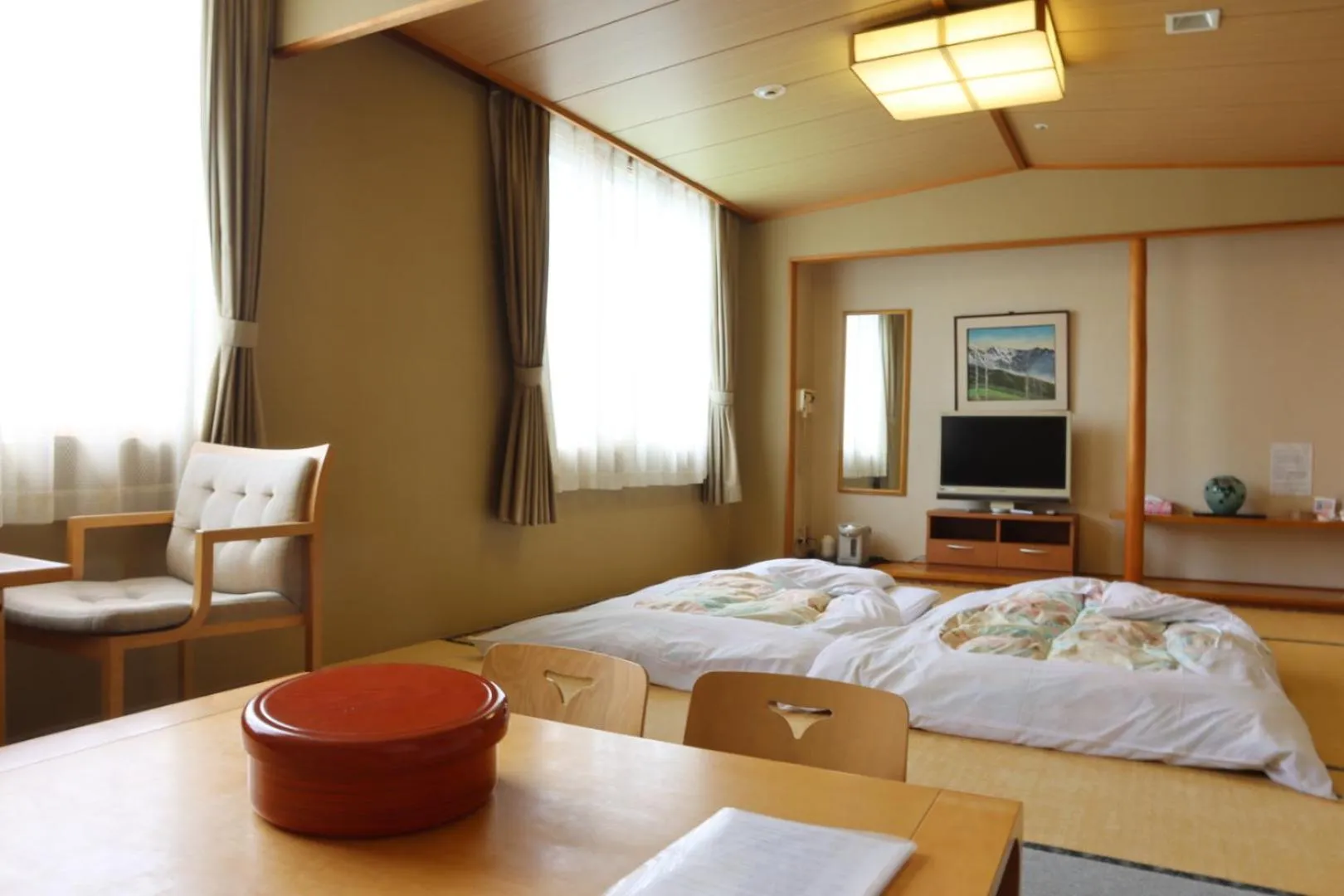 Bed in Hotel Tetoraresort Tokachigawa