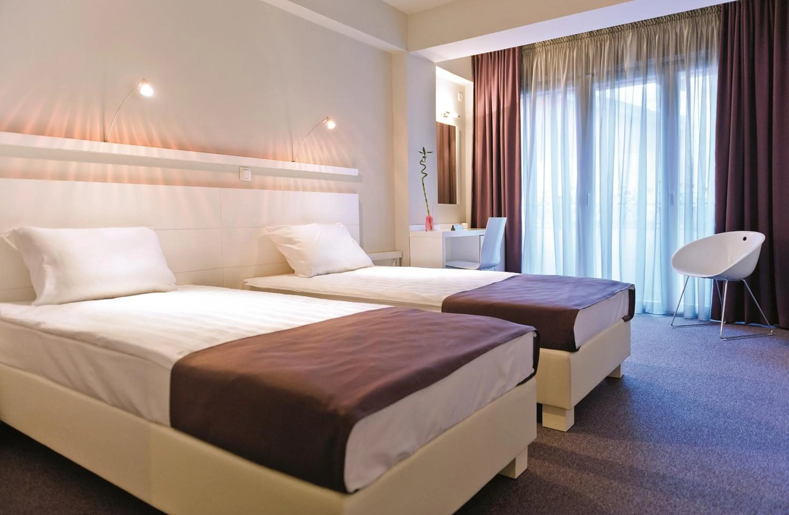 Bed in Leonardo Hotel