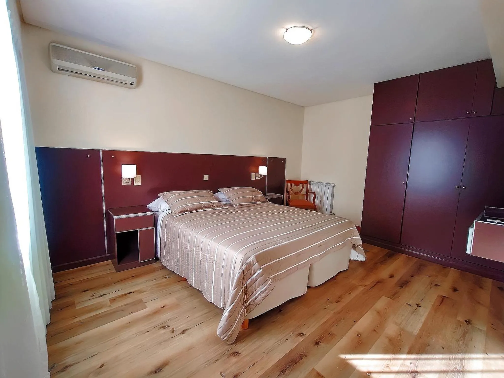 Bed in Cóndor Suites Apart Hotel