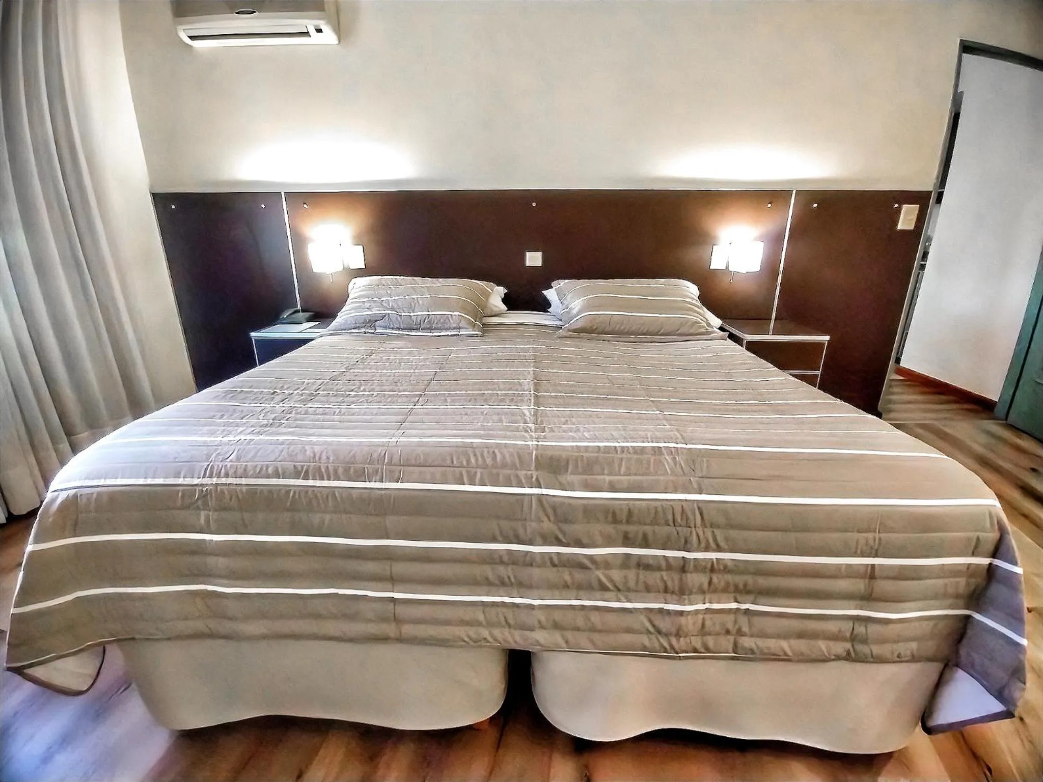 Bed in Cóndor Suites Apart Hotel