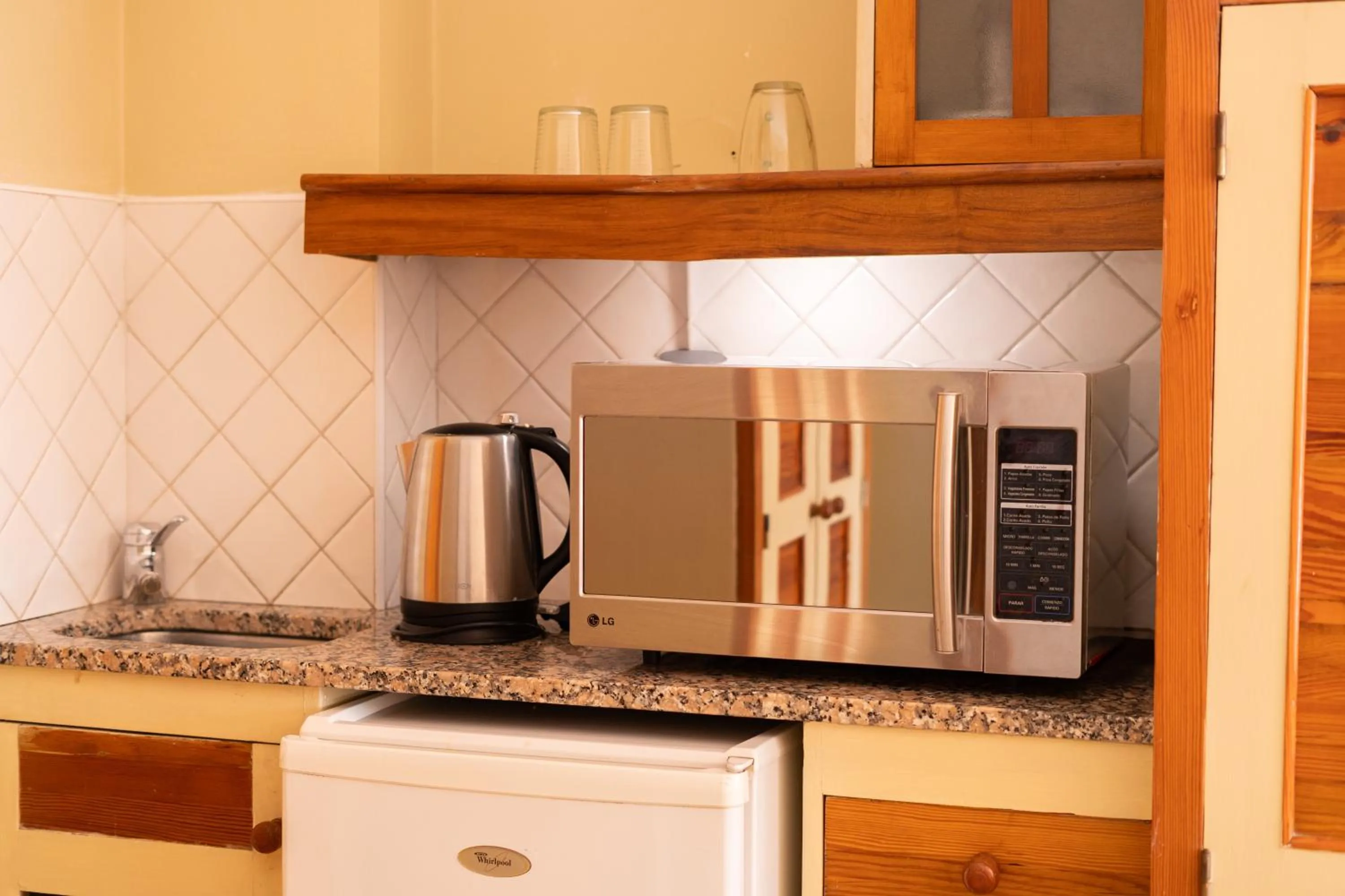 Kitchen or kitchenette in Hotel Xumec Mendoza Centro