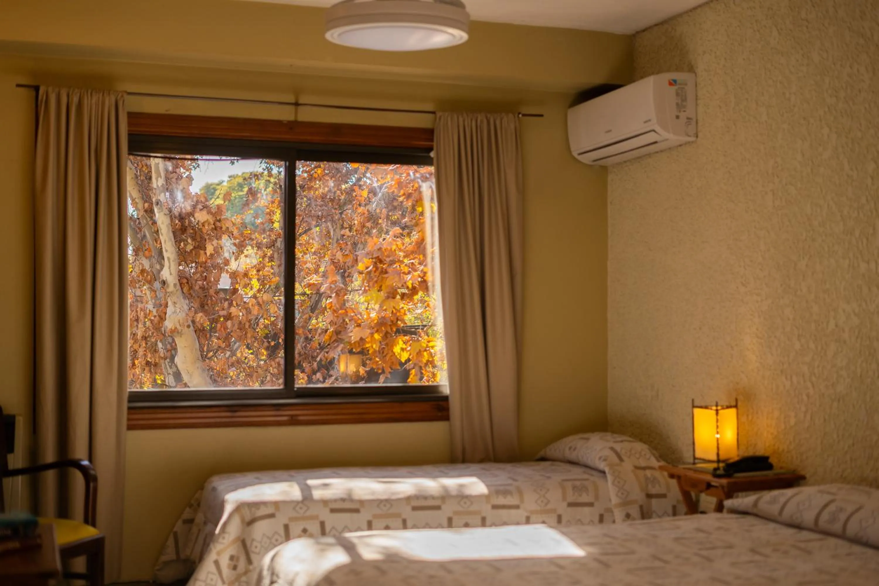 Bed in Hotel Xumec Mendoza Centro