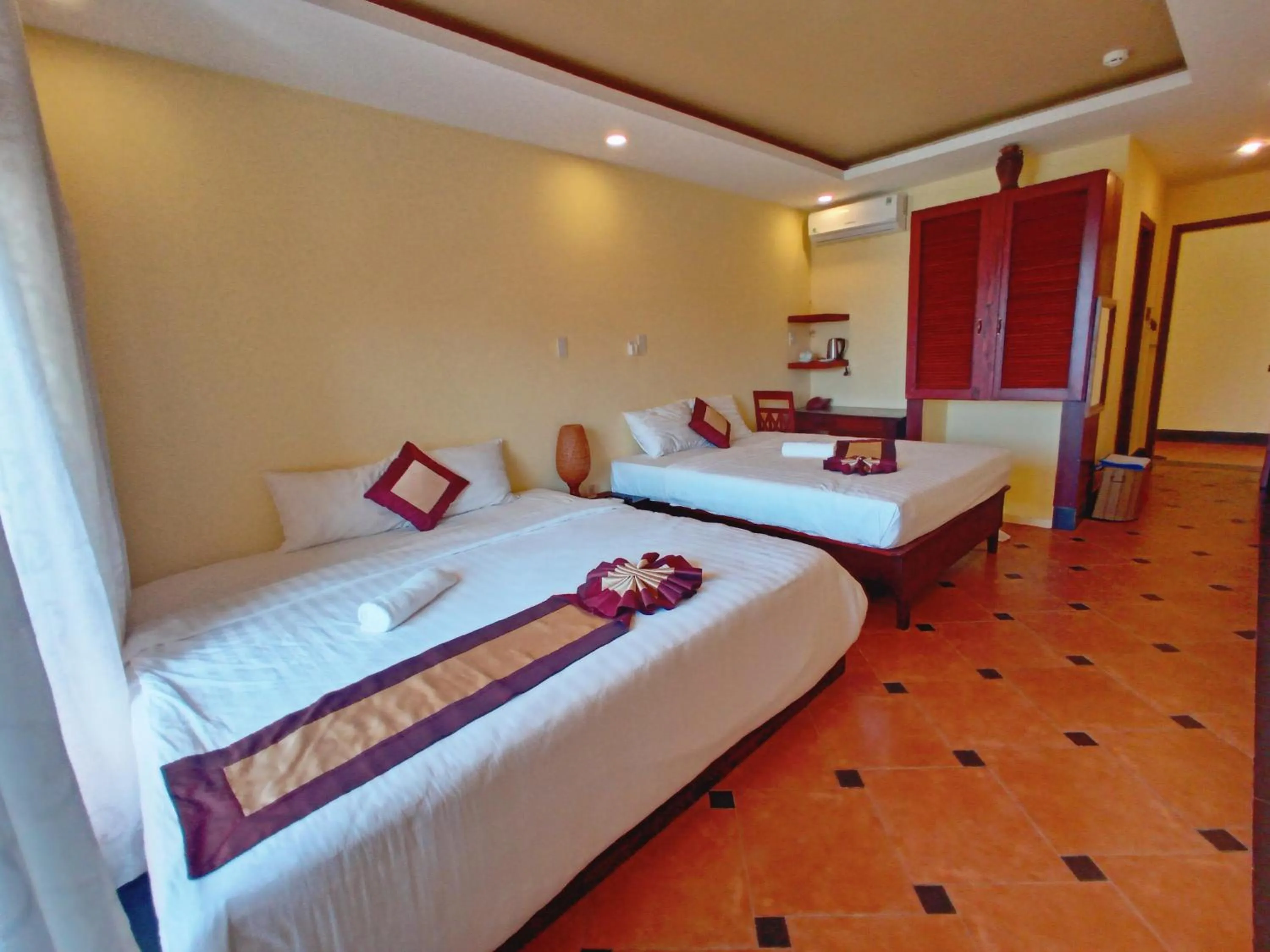 Bed in Thai Hoa Mui Ne Resort