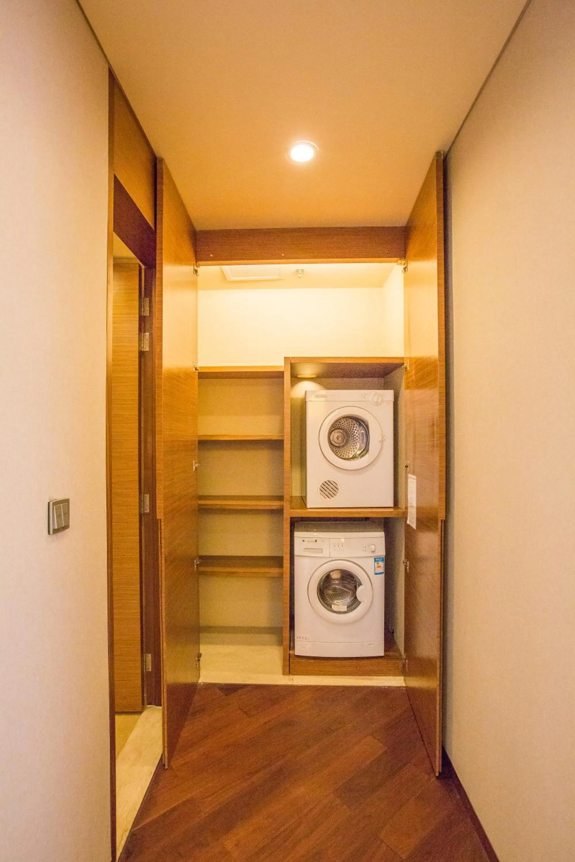 washing machine in Marriott Executive Apartment Tianjin Lakeview