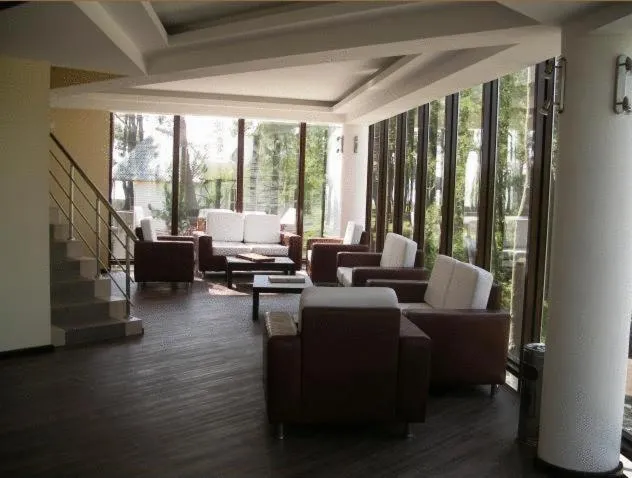 Communal lounge/ TV room in Villa ReTa Hotel & SPA
