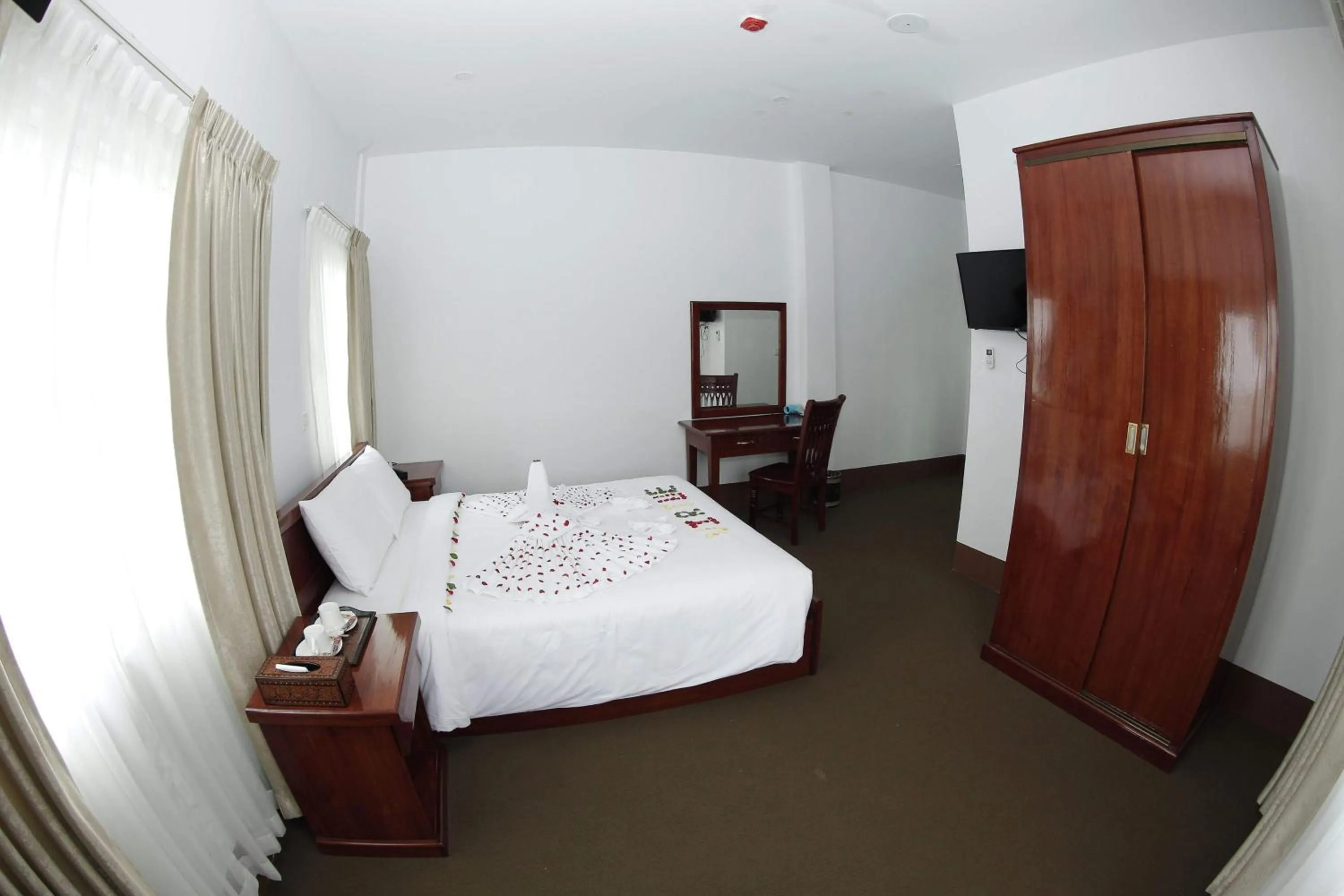 Bedroom in Virtue Highland Hotel