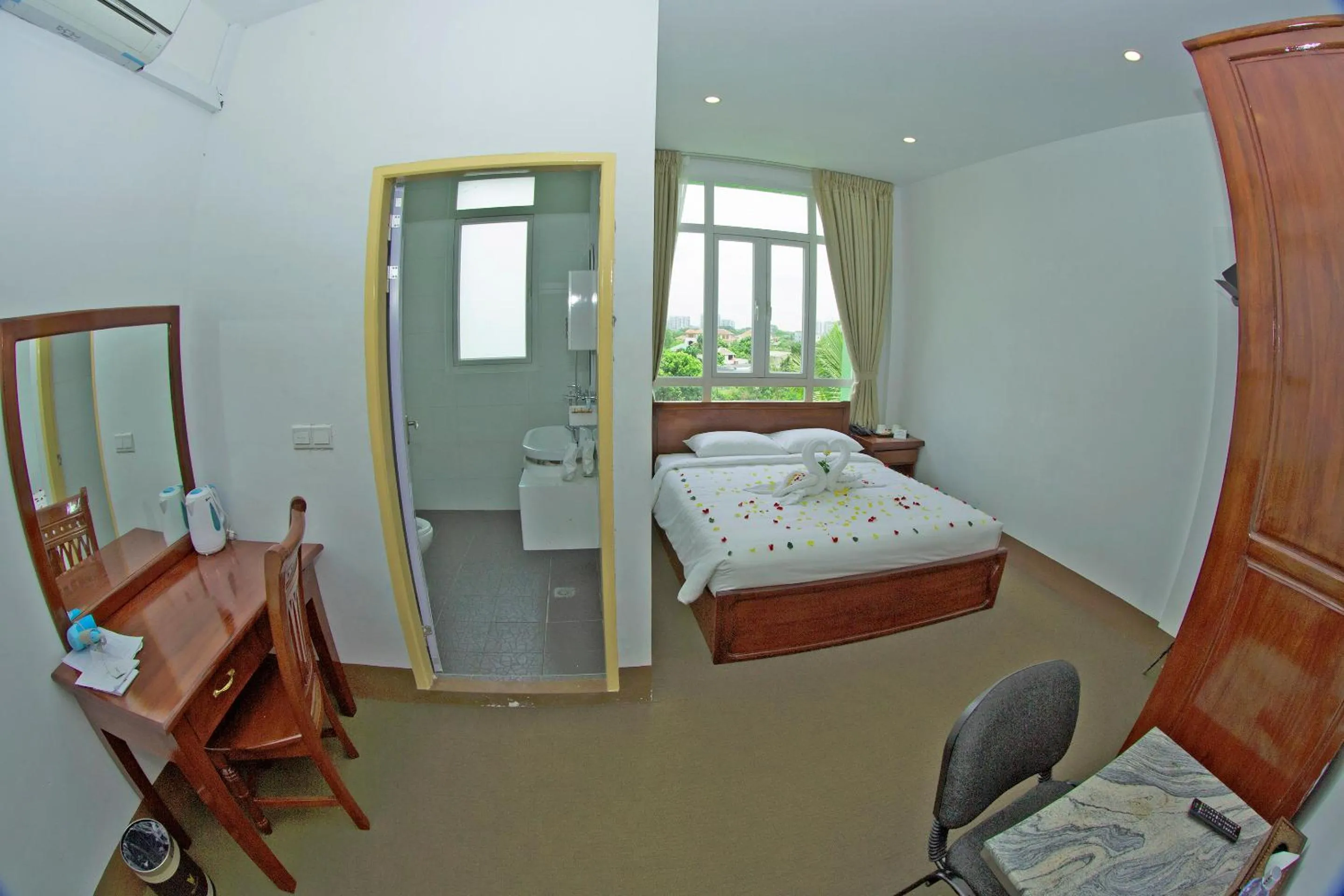 Bedroom in Virtue Highland Hotel