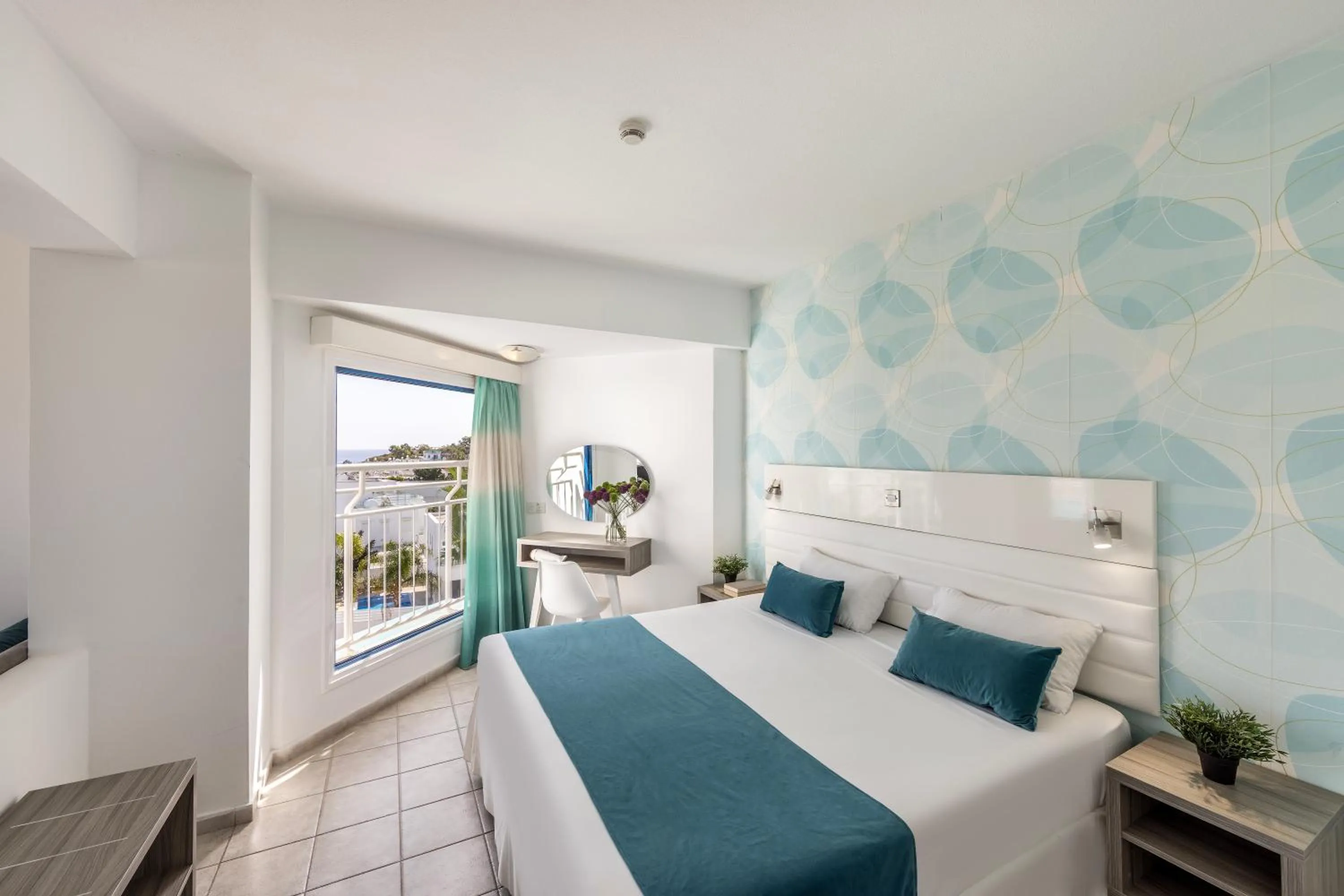 Bed in Lantiana Gardens ApartHotel