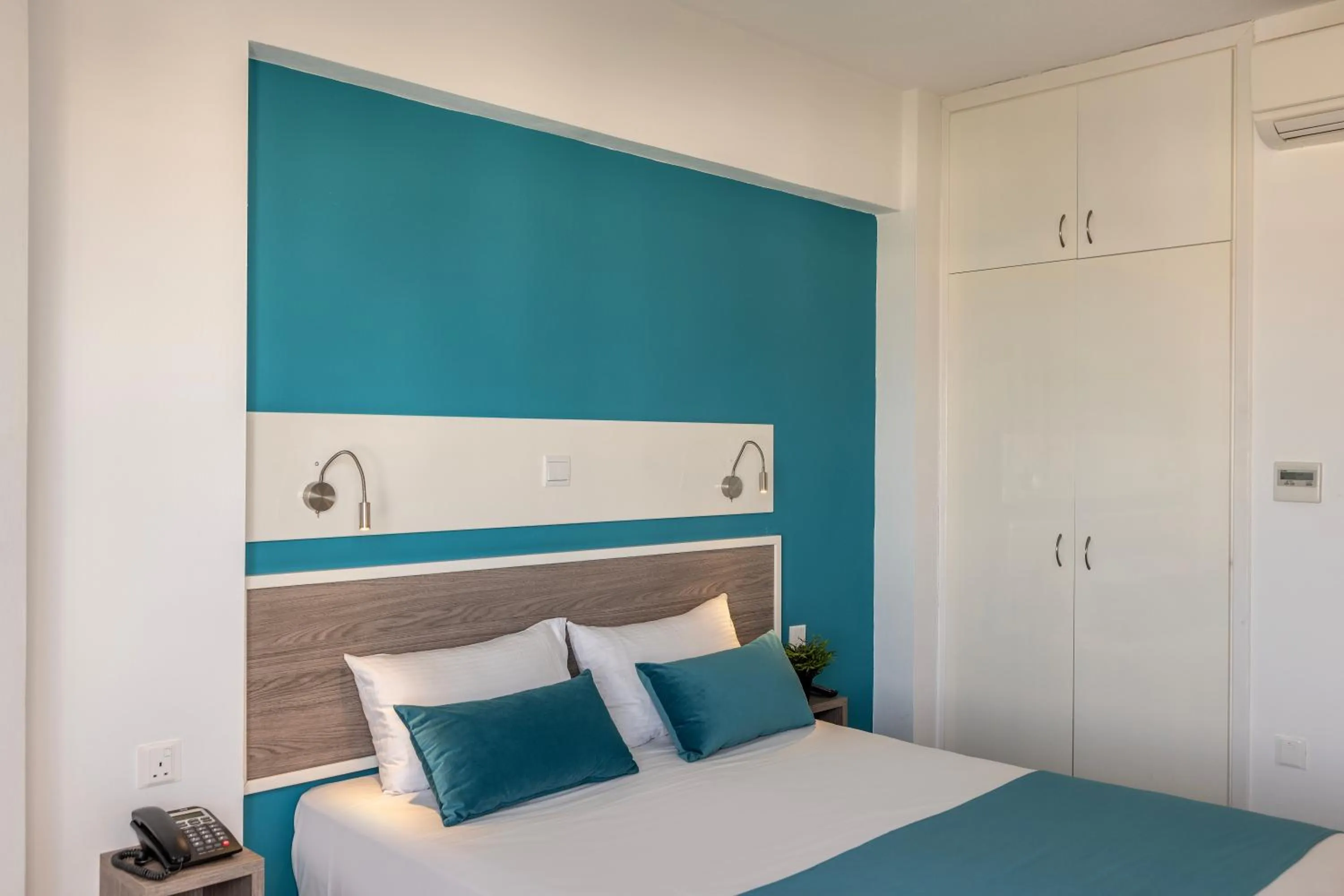 Bed in Lantiana Gardens ApartHotel