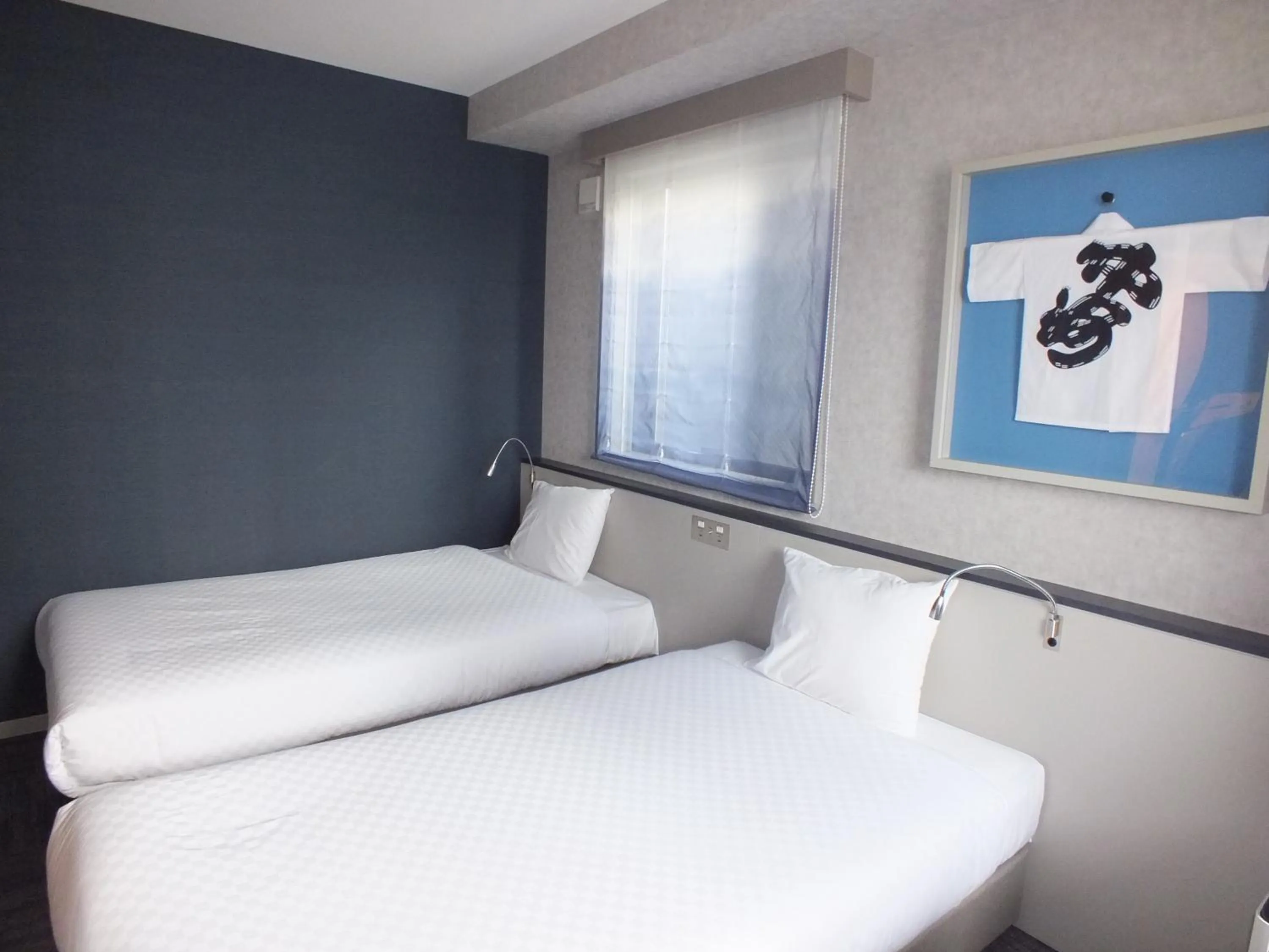Photo of the whole room, Bed in Henn na Hotel Fukuoka Hakata
