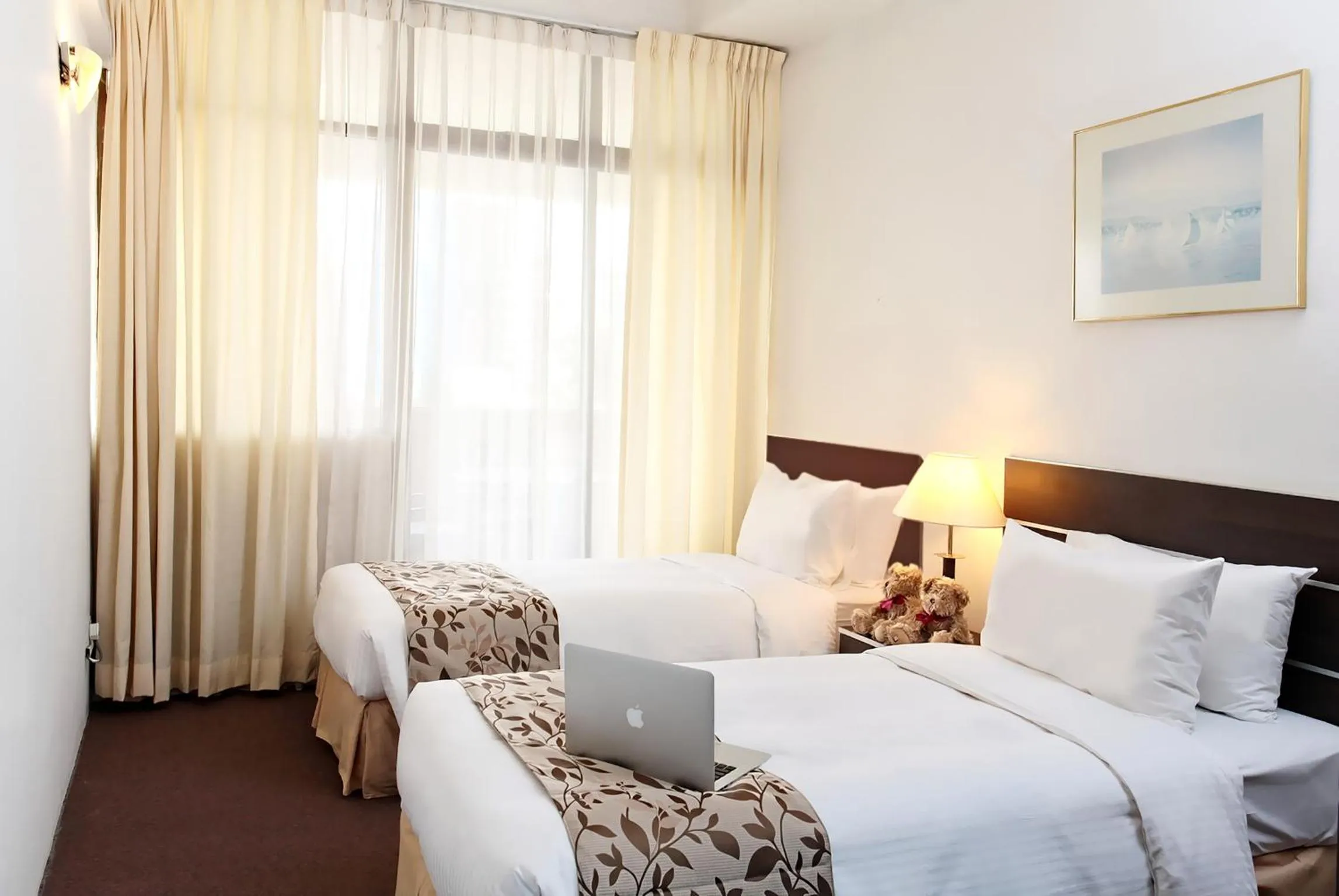 Bed in Far East Plaza Residences by Far East Hospitality