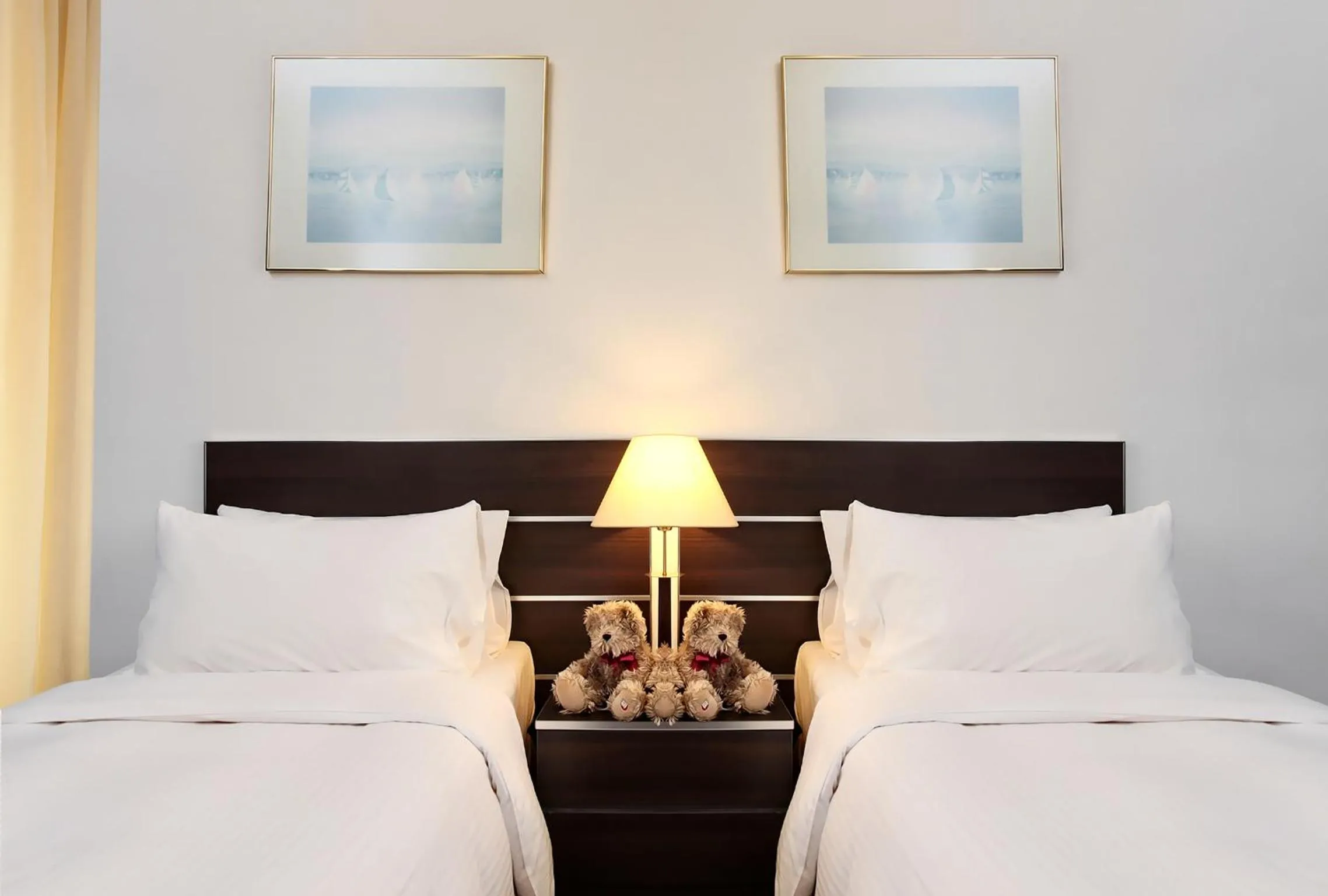 Bed in Far East Plaza Residences by Far East Hospitality