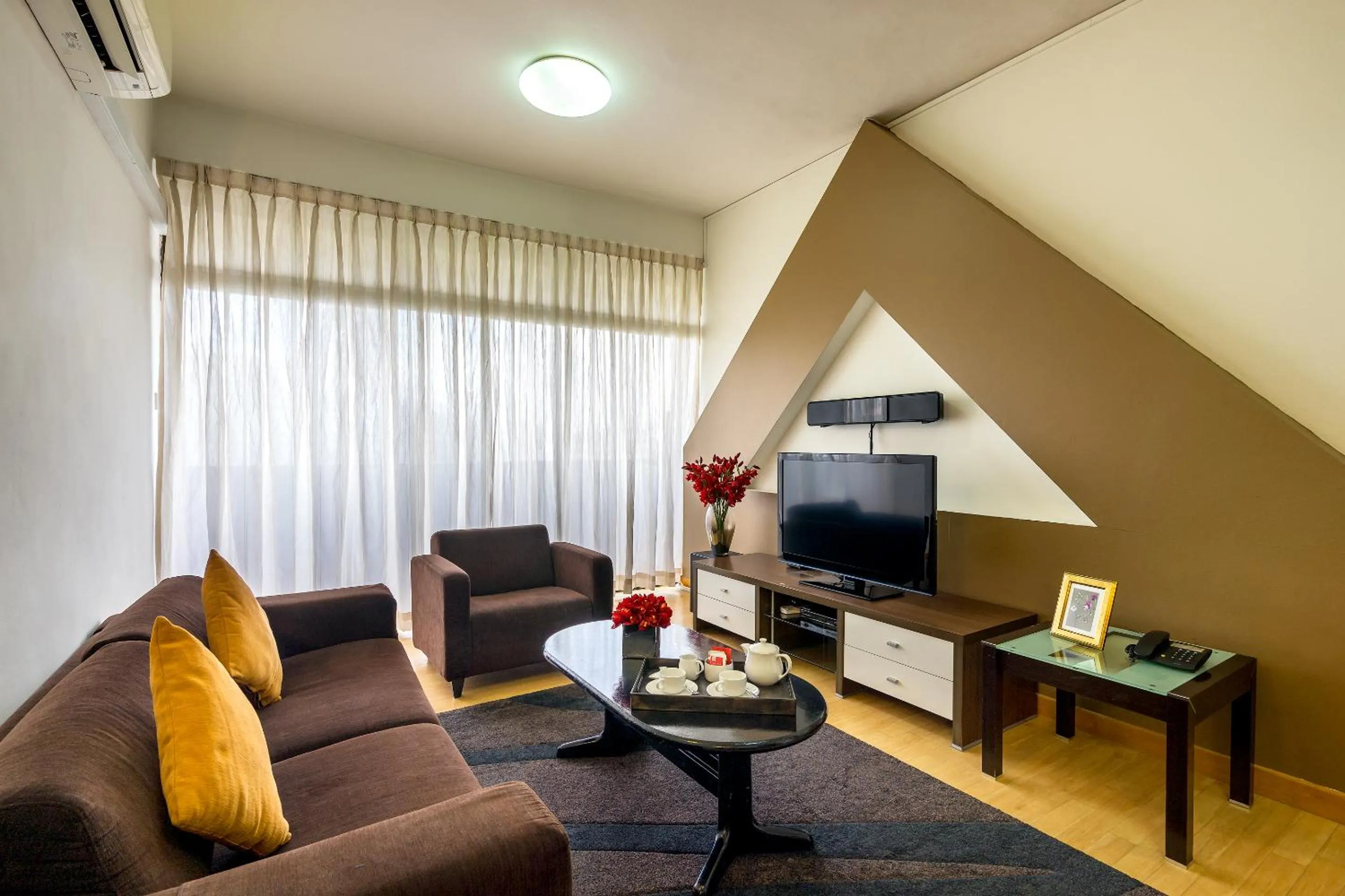 Living room in Far East Plaza Residences by Far East Hospitality