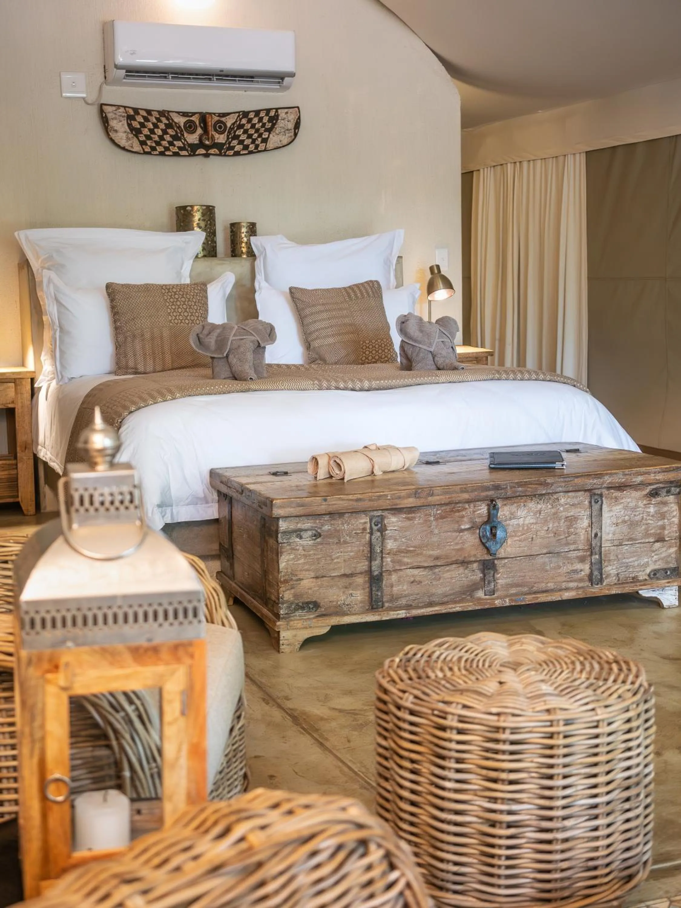 Bed in Nyati Safari Lodge