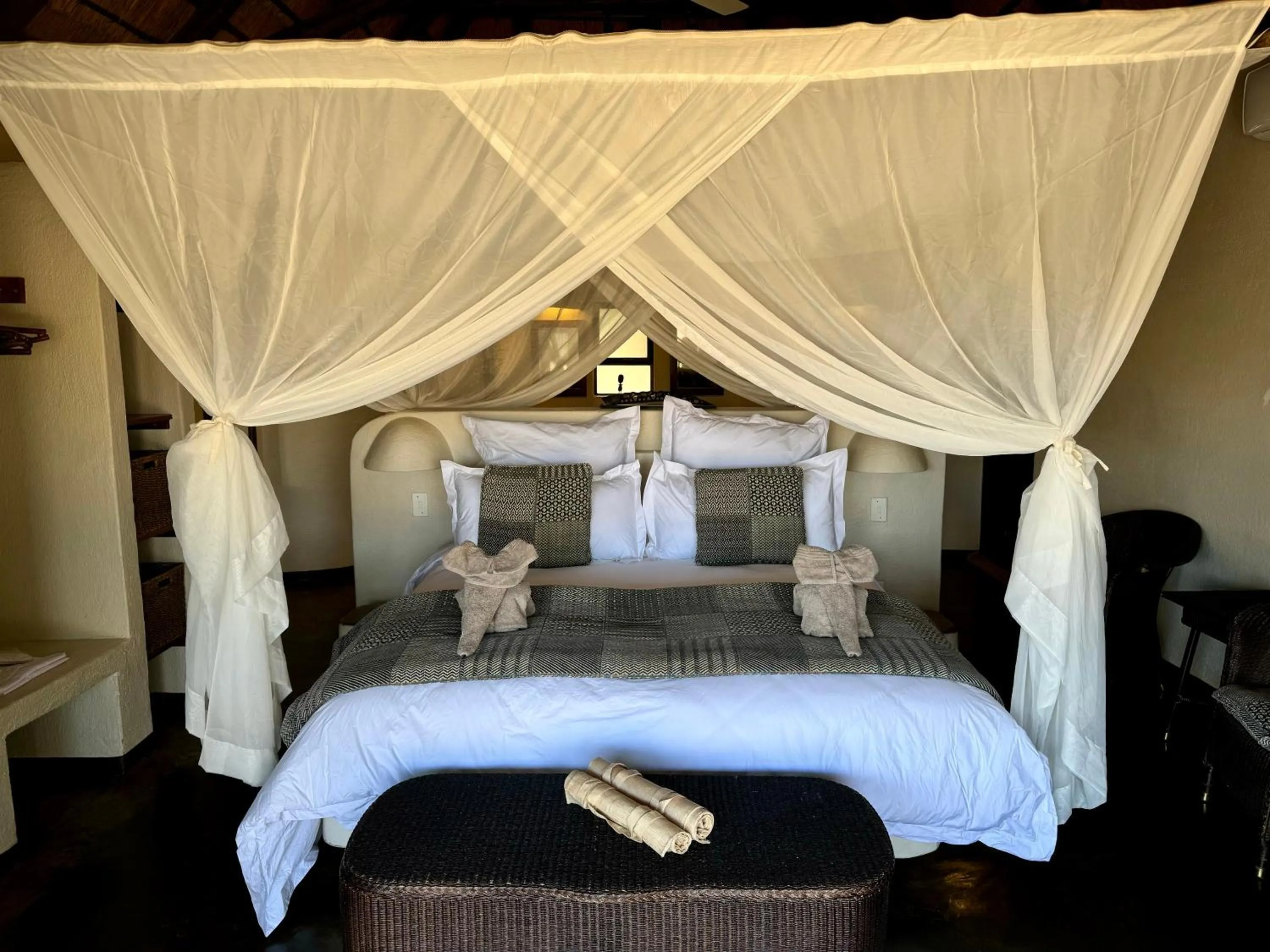 Bed in Nyati Safari Lodge