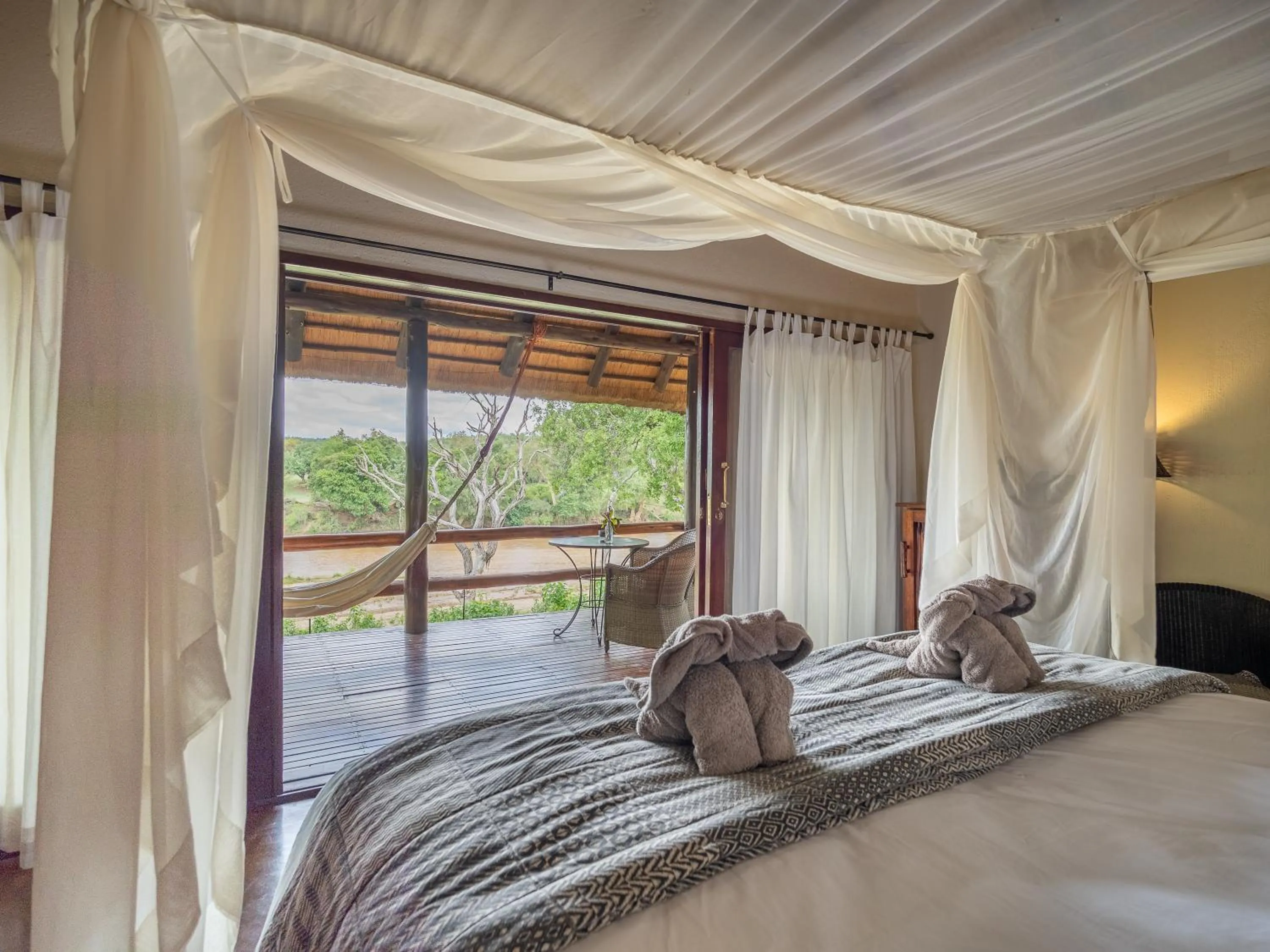 Bed in Nyati Safari Lodge