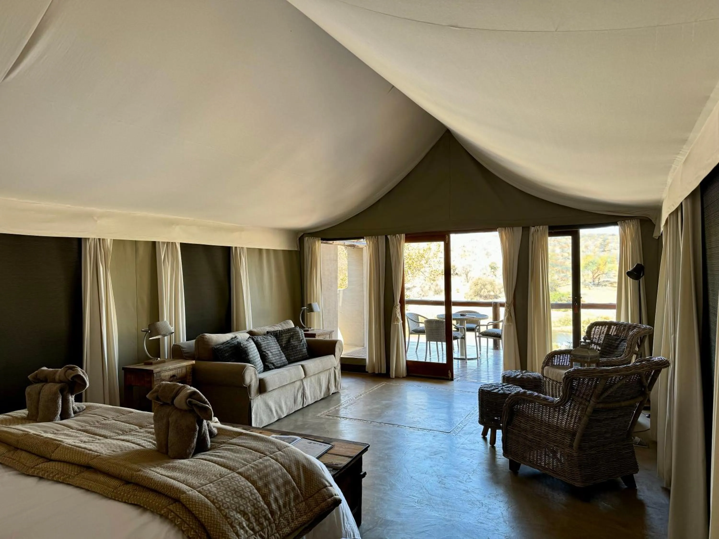 Seating area, Bed in Nyati Safari Lodge