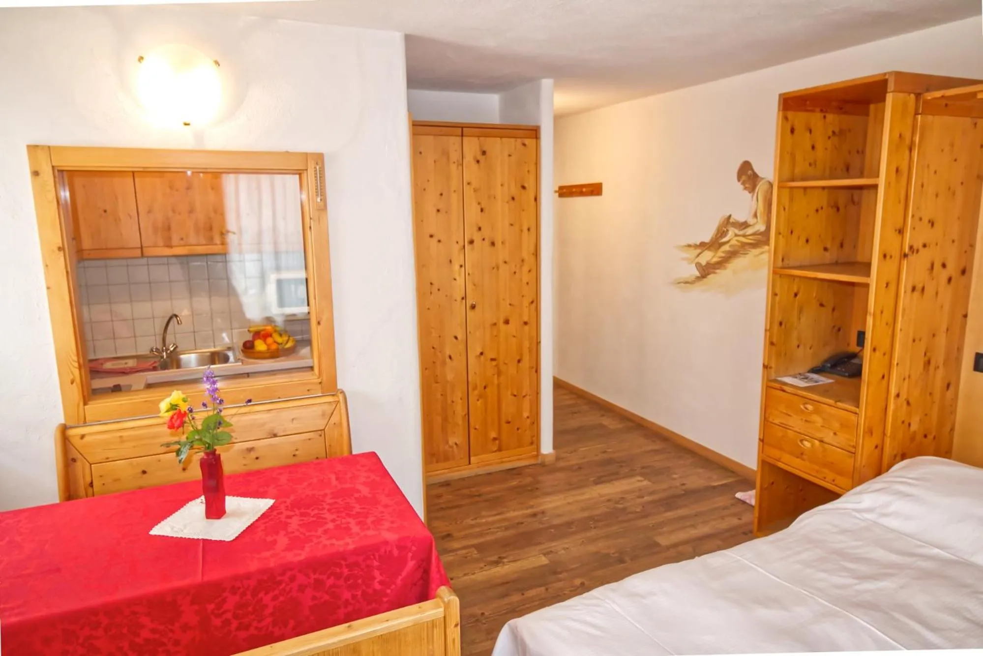 Living room, Bed in Residence Miramonti