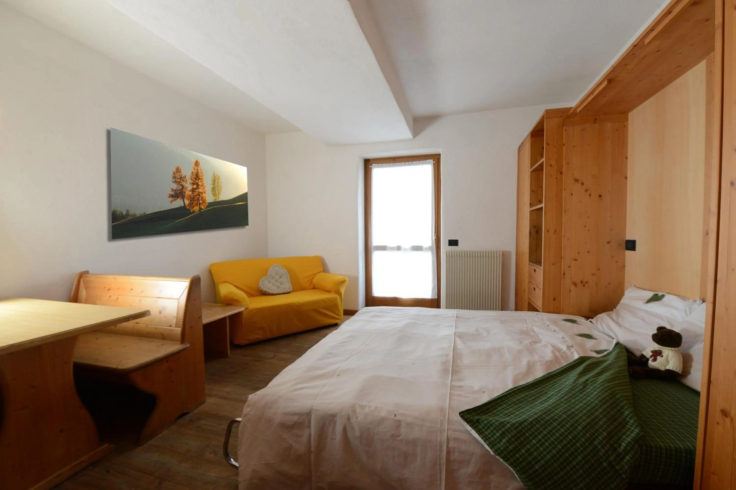 Photo of the whole room, Bed in Residence Miramonti