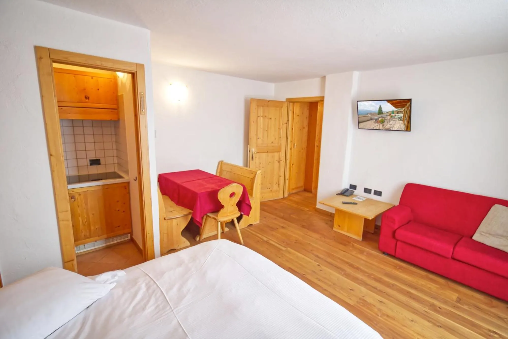 Living room, Bed in Residence Miramonti