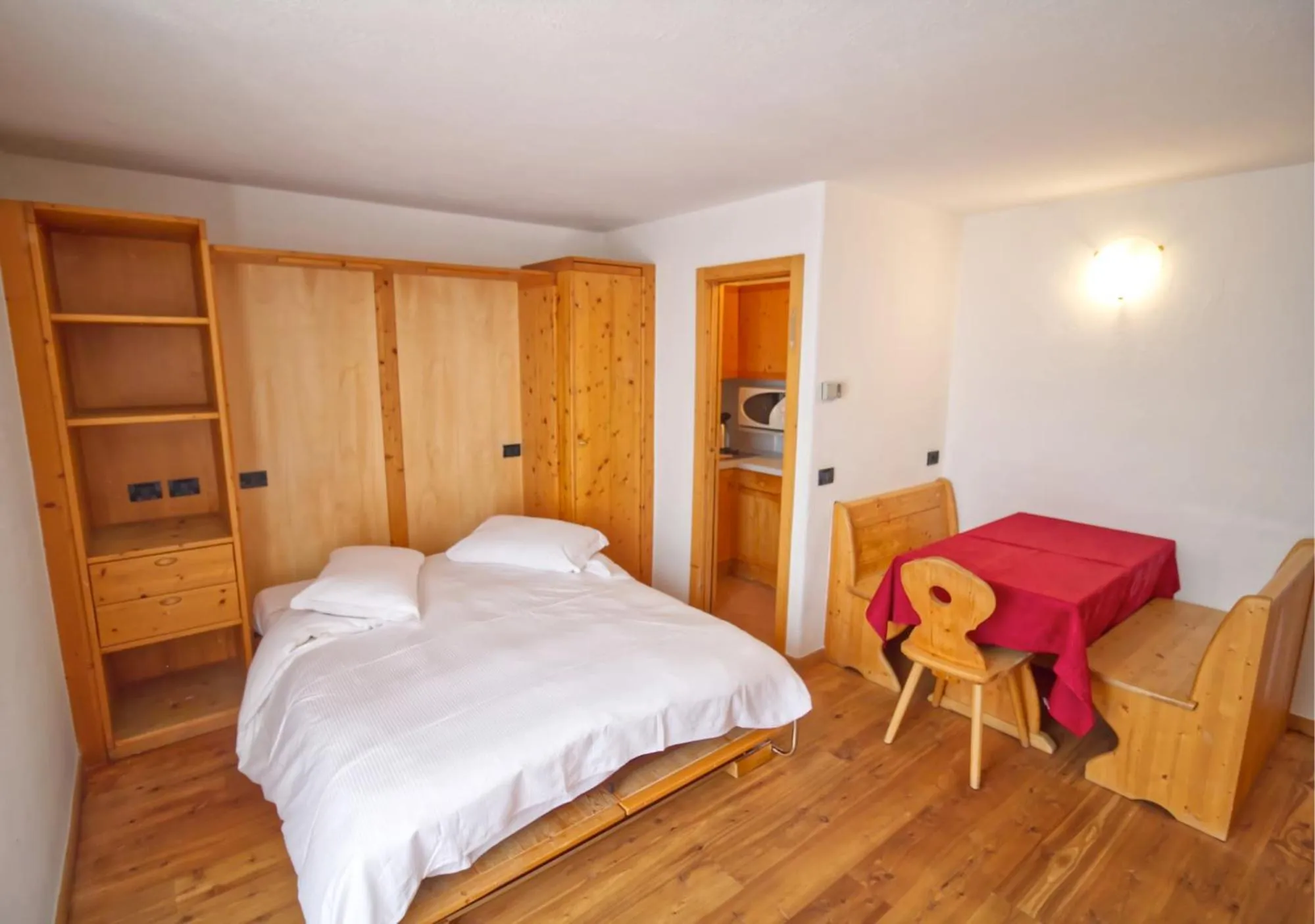 Photo of the whole room, Bed in Residence Miramonti