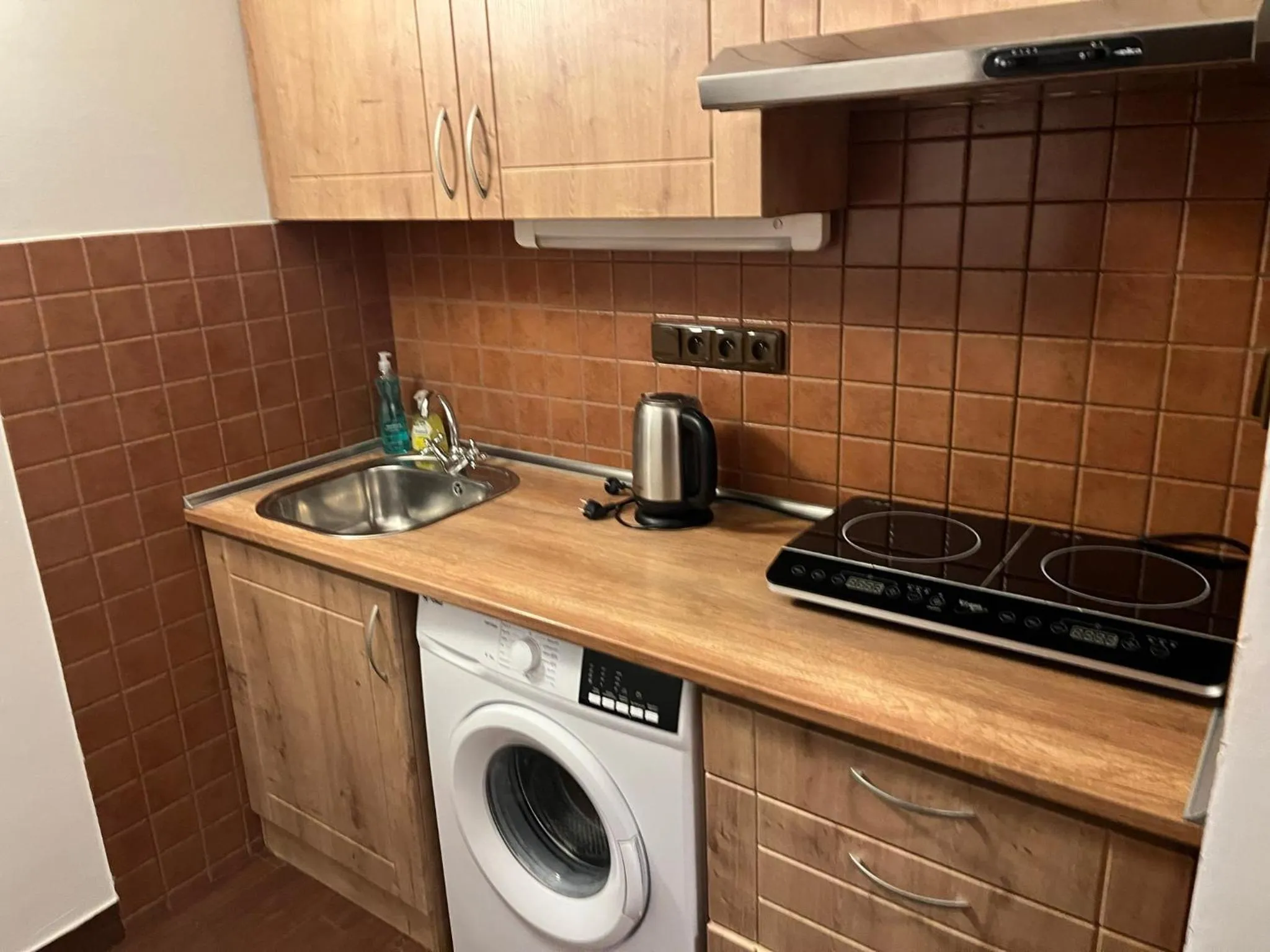 Kitchen or kitchenette in Mila Apartments