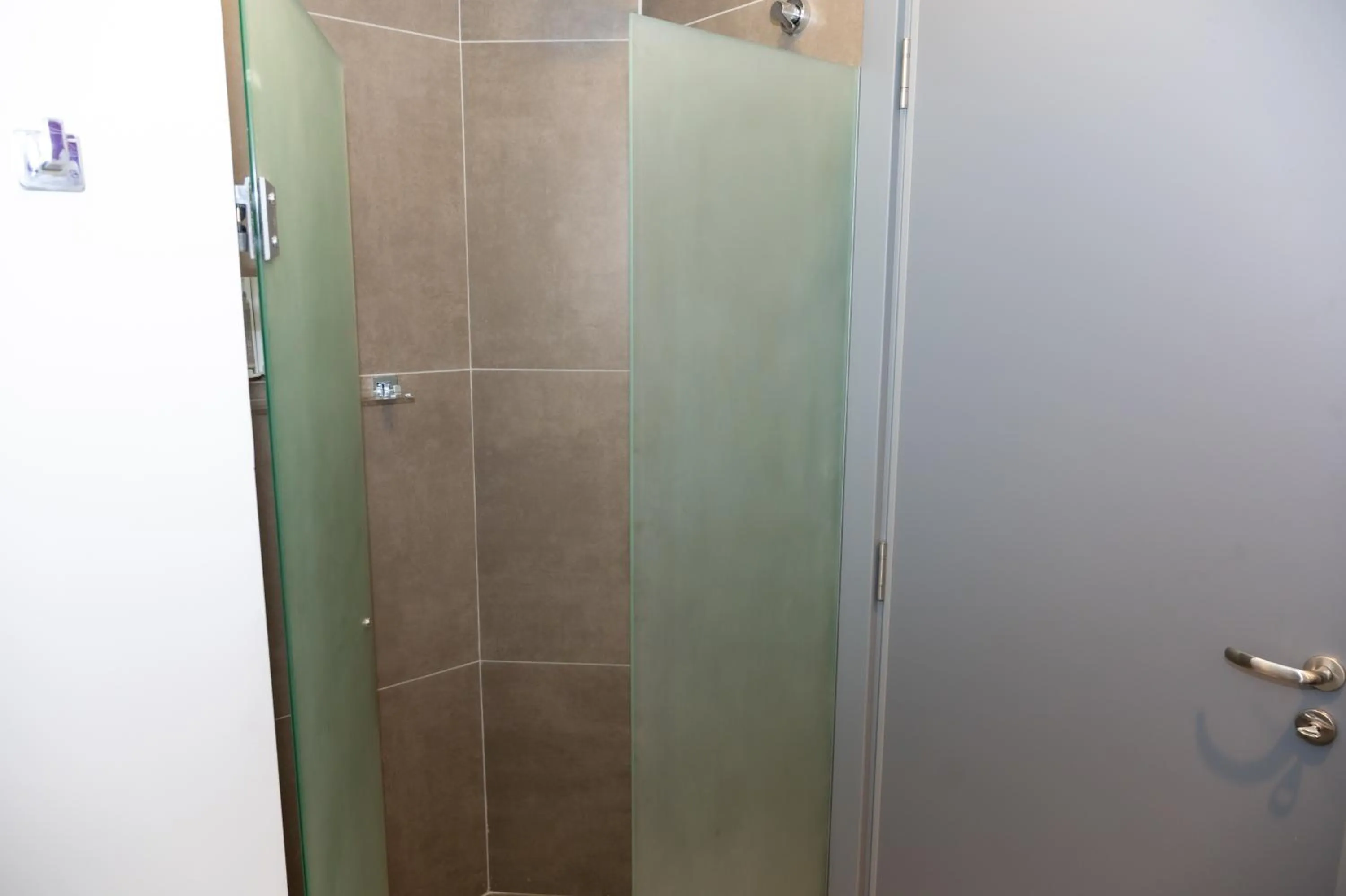 Bedroom in Delcas Hotel