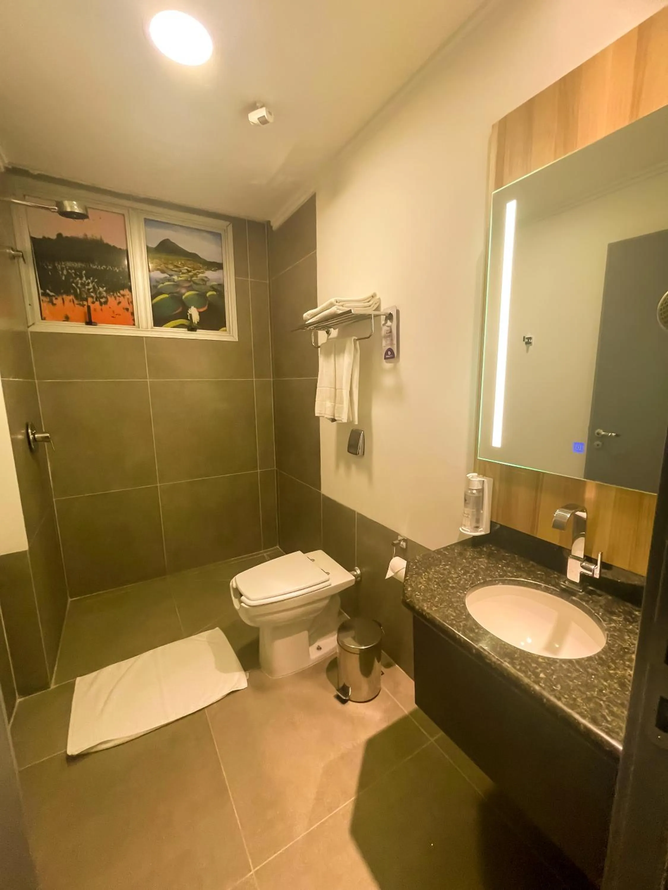 Bedroom in Delcas Hotel